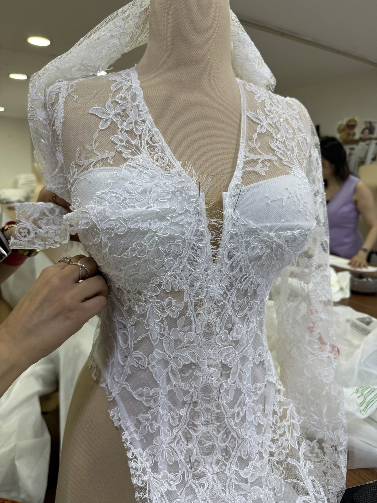 Hand-finished corset construction on a dress form in the Lucidbride İzmir atelier