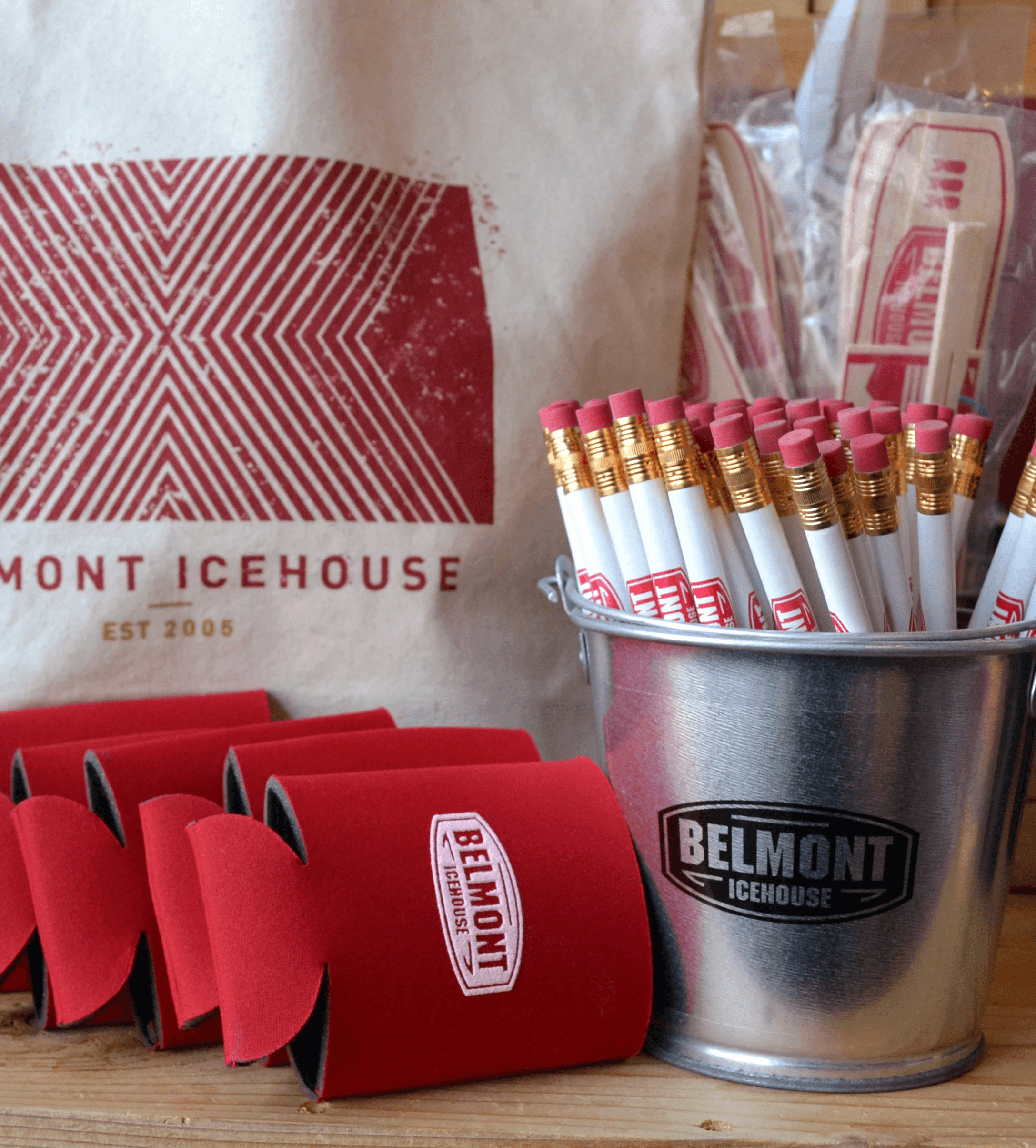 Belmont swag tote bag, pencils, koozies, and balsam plane toy