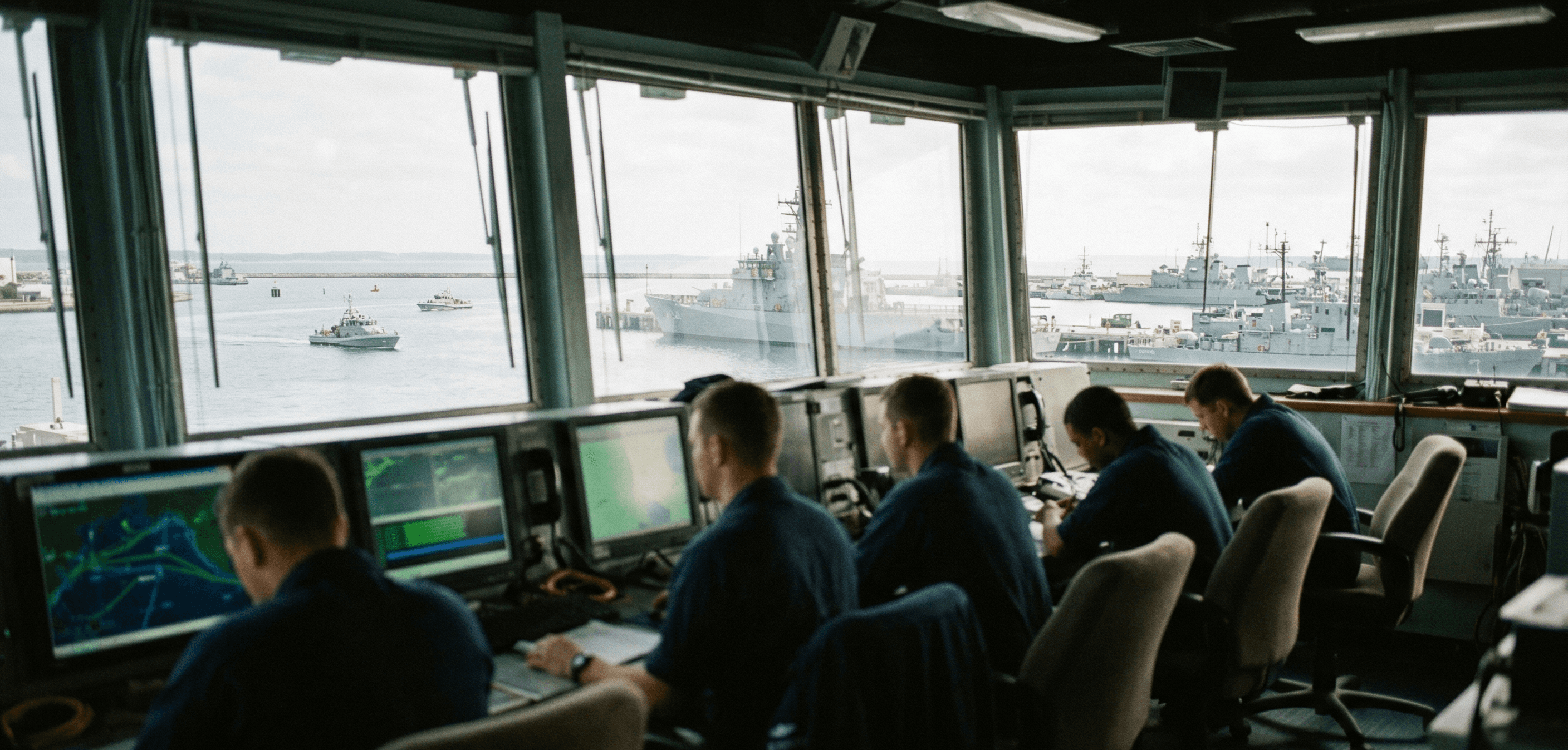 shore operations overlooking fleet of vessels