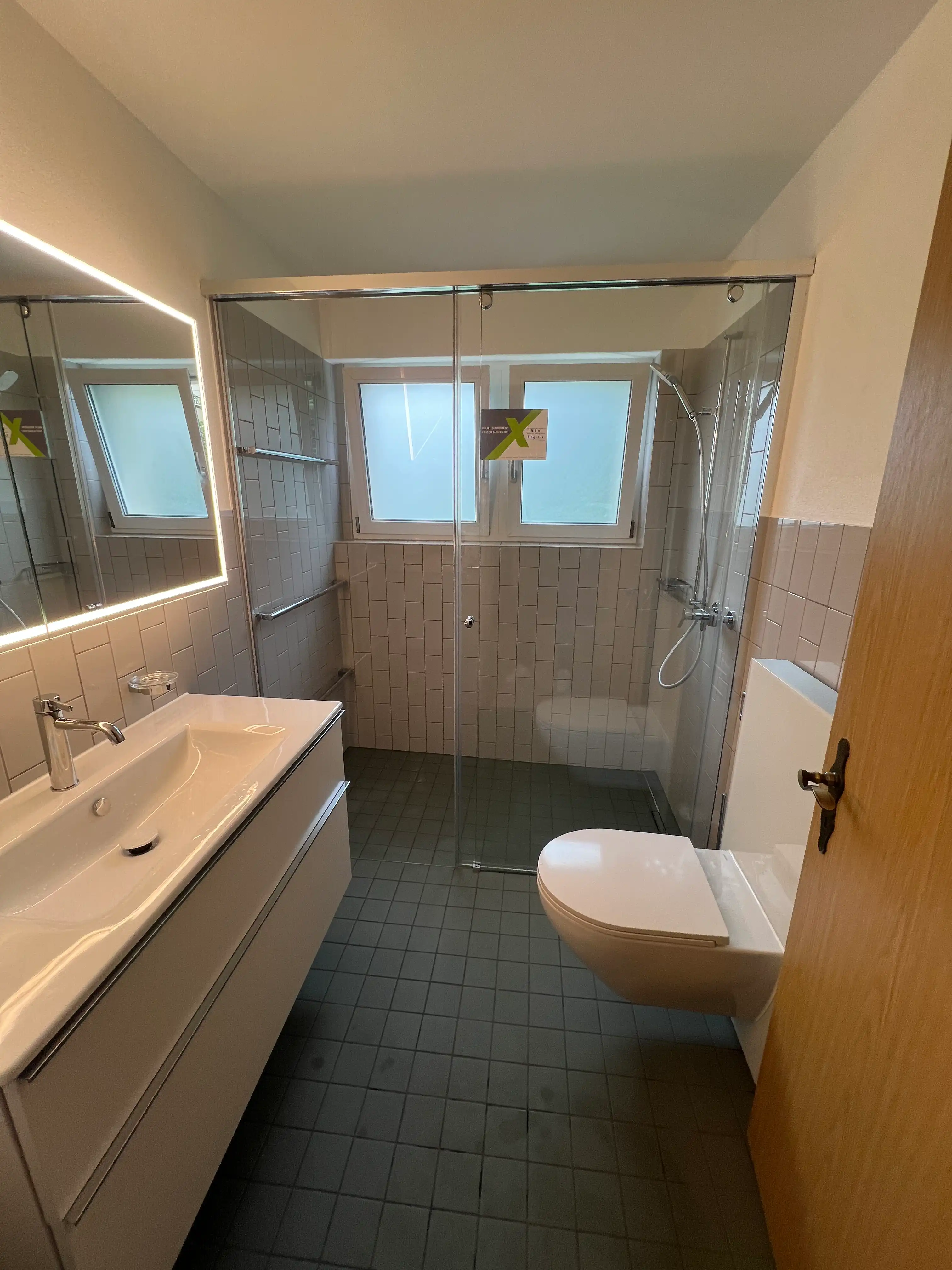 HOTI Badumbau bei Familie Grigo in Buchs mit Dusche, WC und Waschtisch