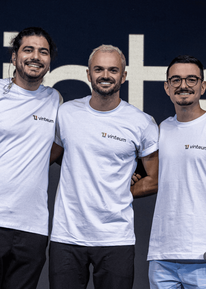 Vinteum co-founders Lucas Ferreira and André Neves with head of engineering Bruno Garcia wearing Vinteum t-shirts