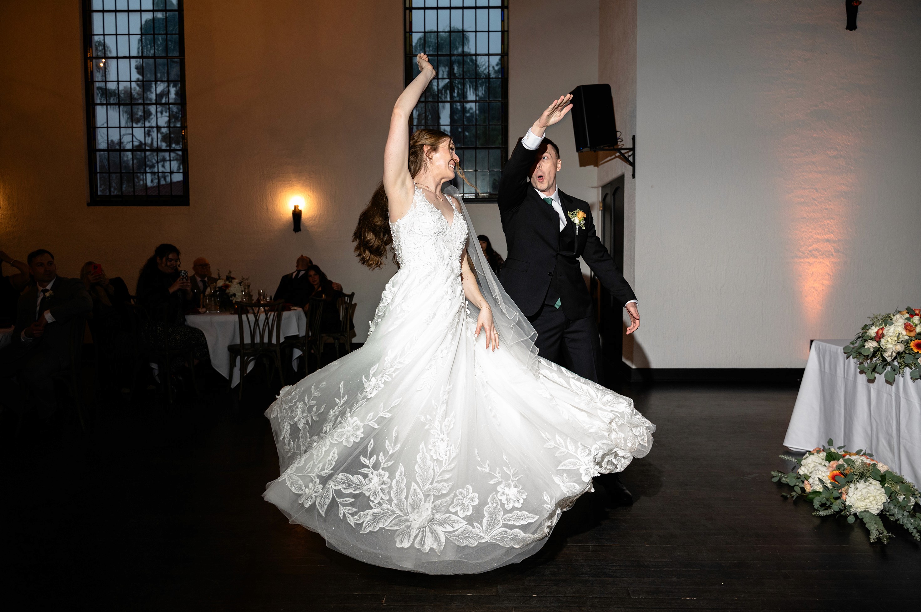 Flat lay wedding details with bouquet, rings, and sparkling bridal heels