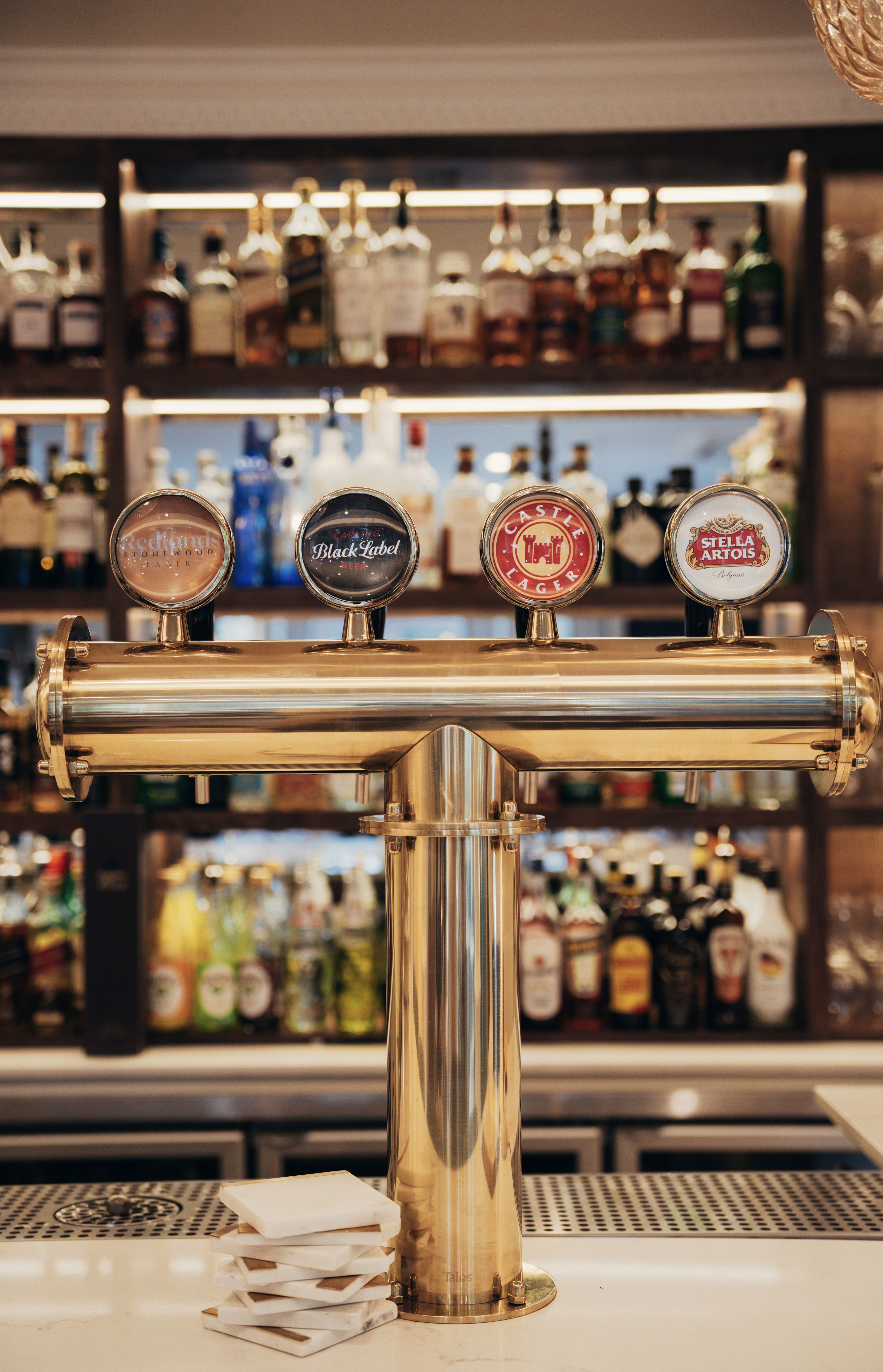 Stylish hotel bar at Redlands with selection of wines, cocktails, and local brews.