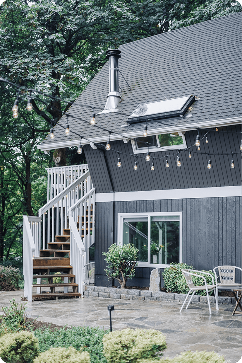 Luxurious marble shower with built-in niche, hexagon mosaic floor tiles, and natural light from Floor & Decor