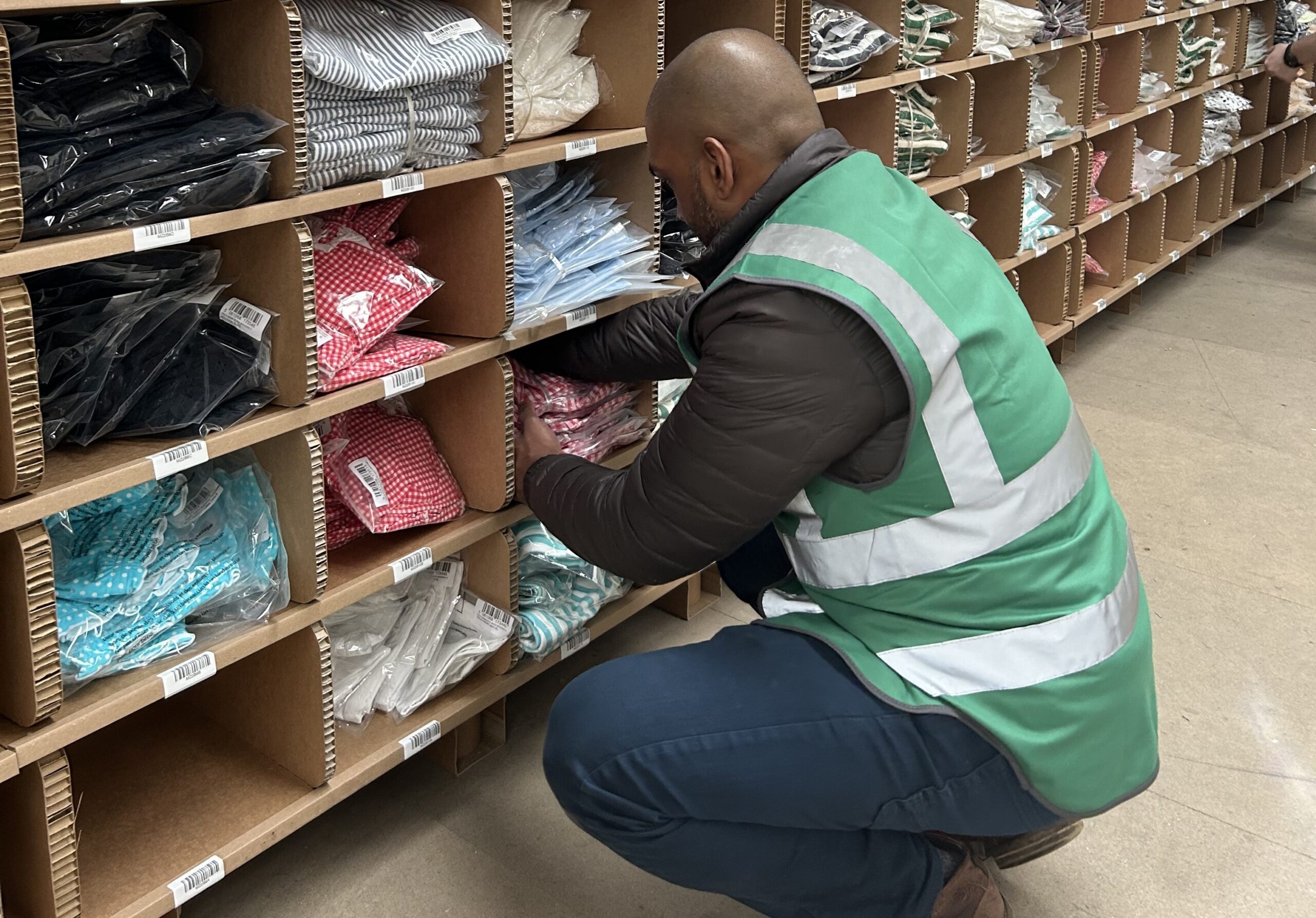 warehouse worker organising stock