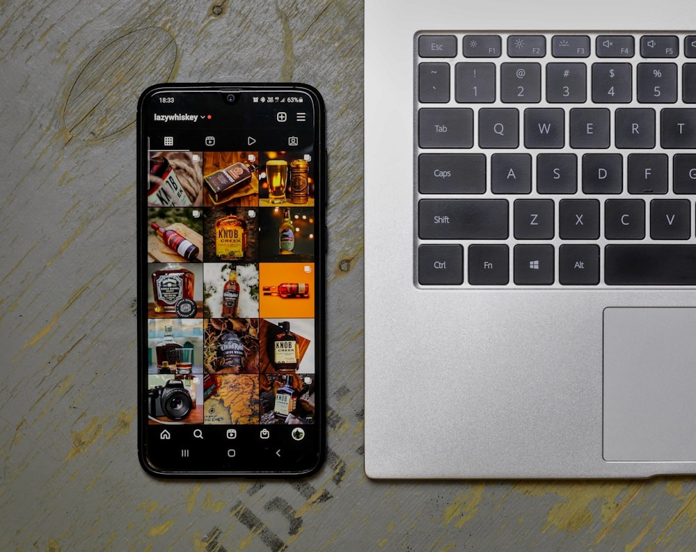 Phone and laptop showing a campaign ready for review and launch