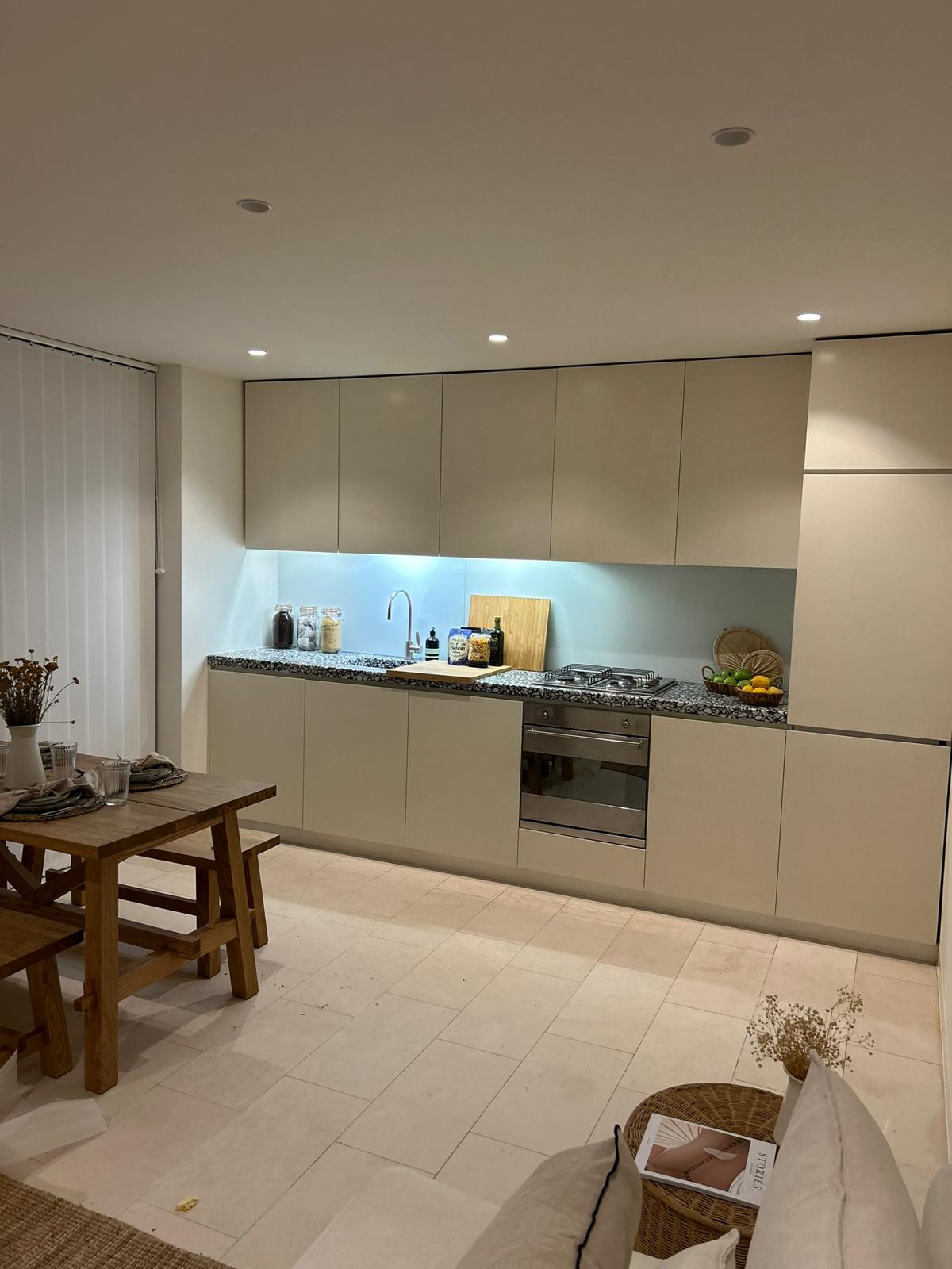 A freshly sprayed kitchen in off white located in Chelmsford, Essex