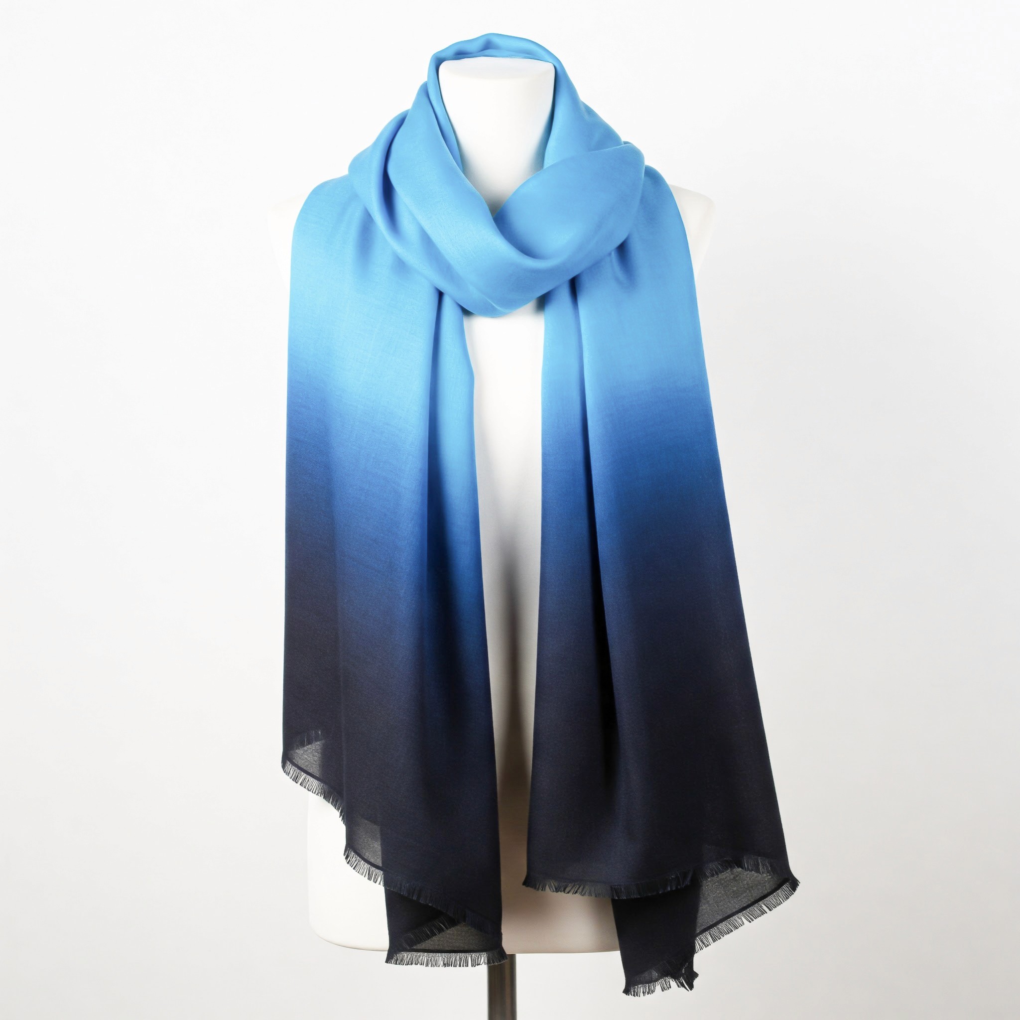 DUNZ blue and black gradient scarf, flowing fabric, luxury fashion accessory, studio/editorial lighting, minimalist style, high-end fashion photography