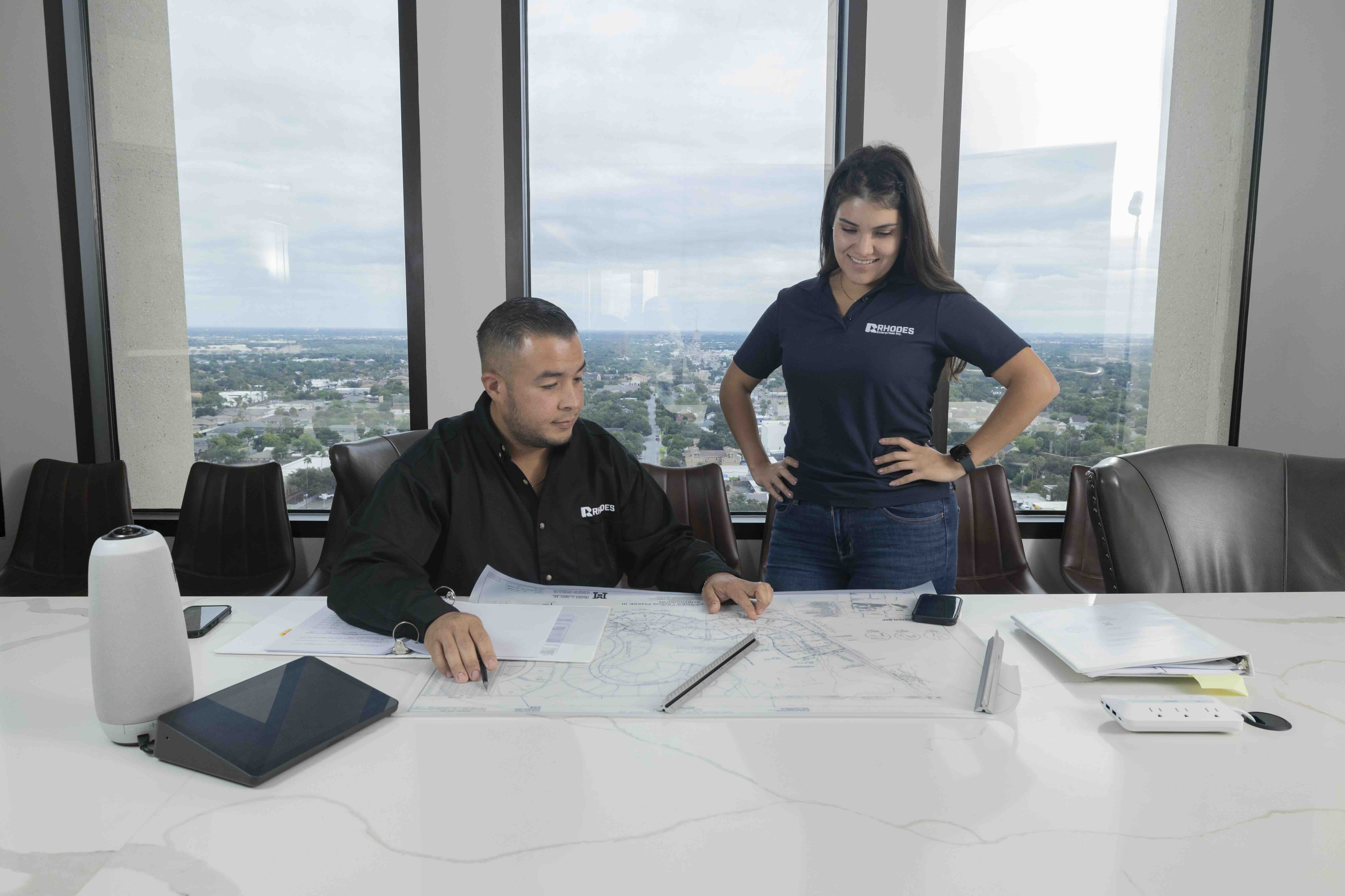 Rhodes Enterprises planning professionals collaborating on community development plans South Texas