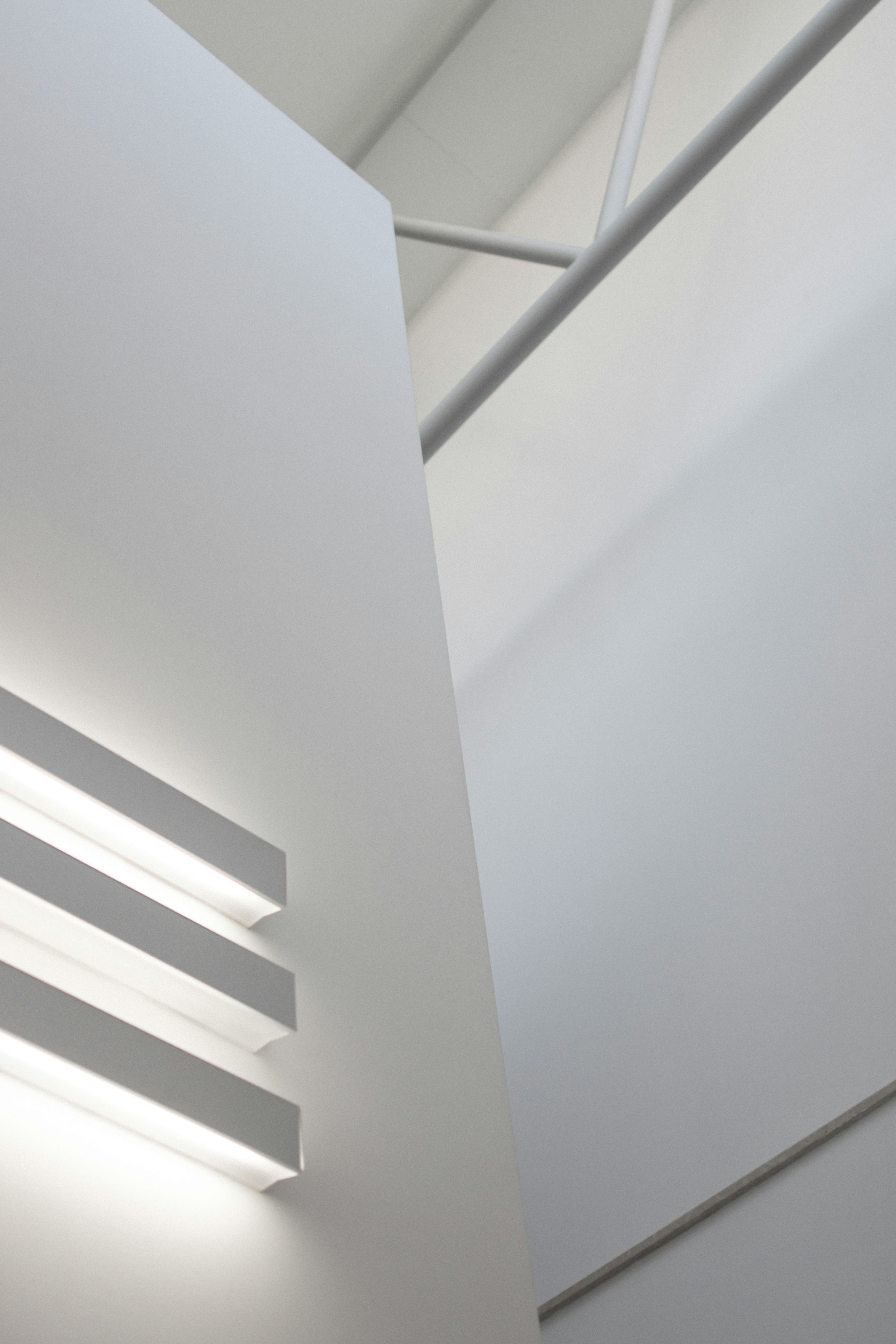 a couple of lights that are on the side of a wall