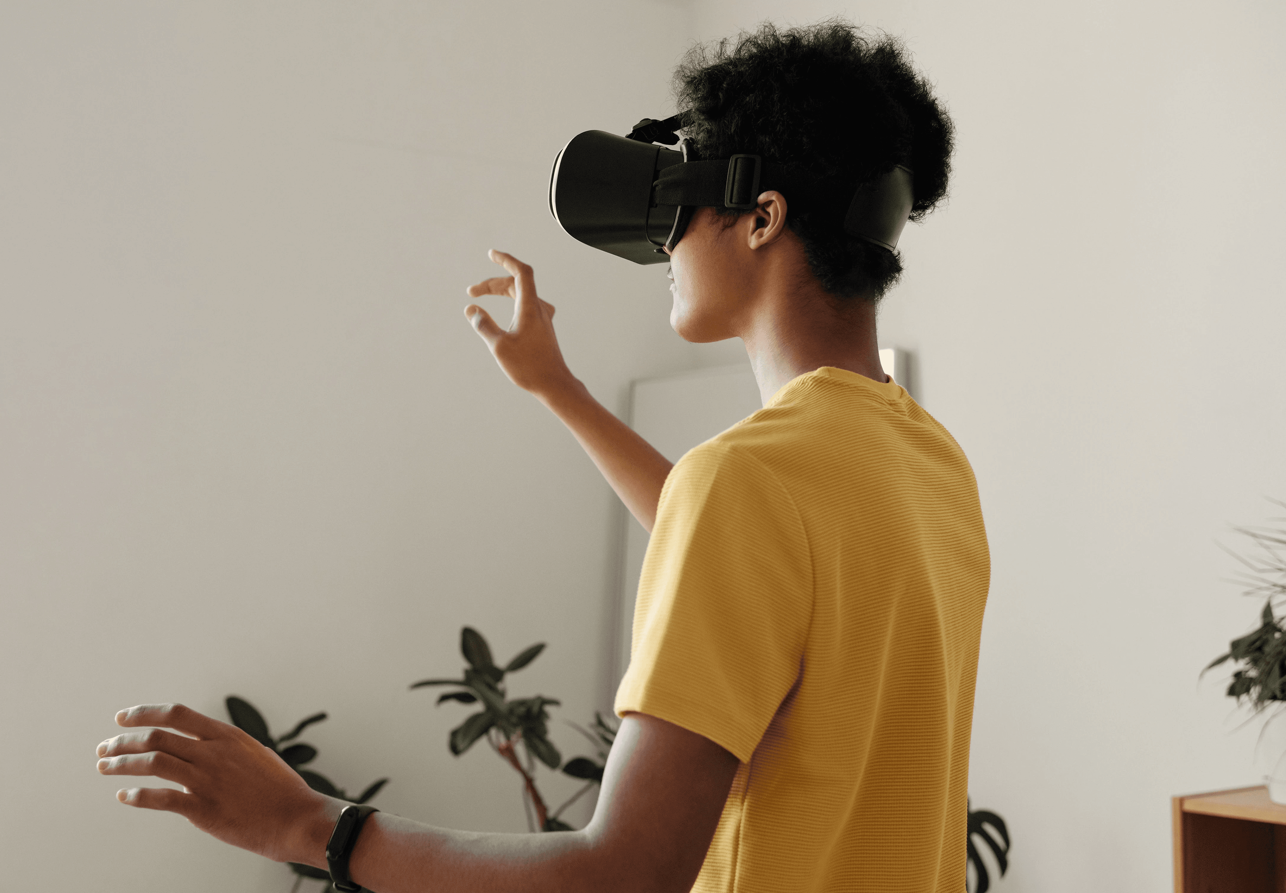 An image of learners sitting on chairs and taking part in VR training. Each learner has a headset on.