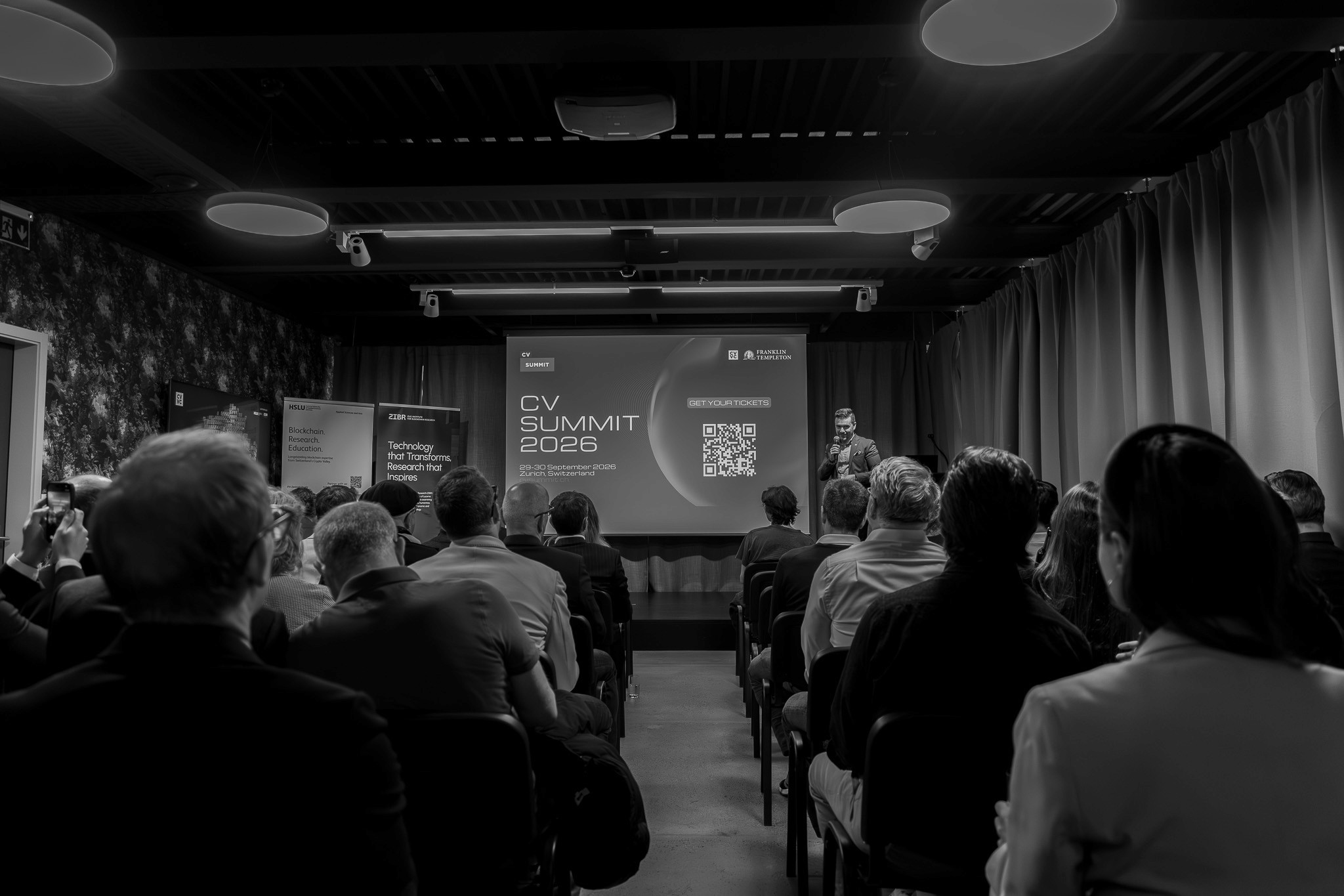 Audience listening to a presentation during the Crypto Valley conference.