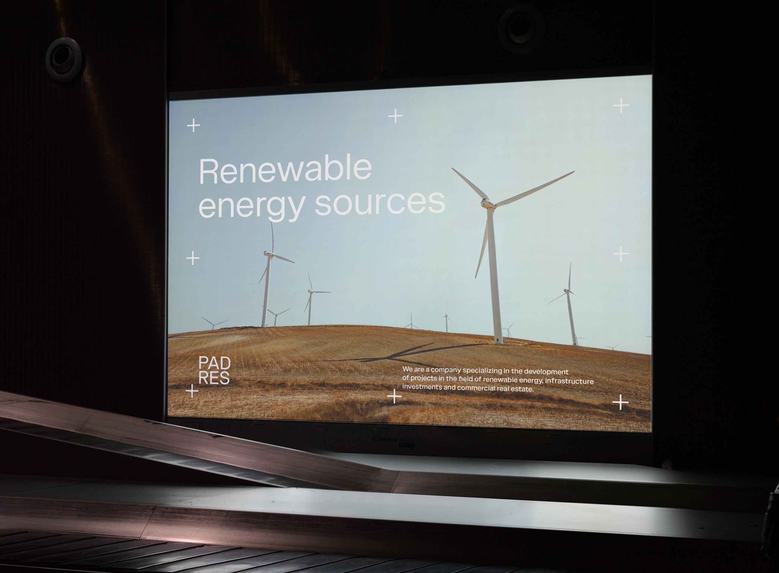 Pad Res Renewable energy sources ad displayed on an airport screen, brand campaign