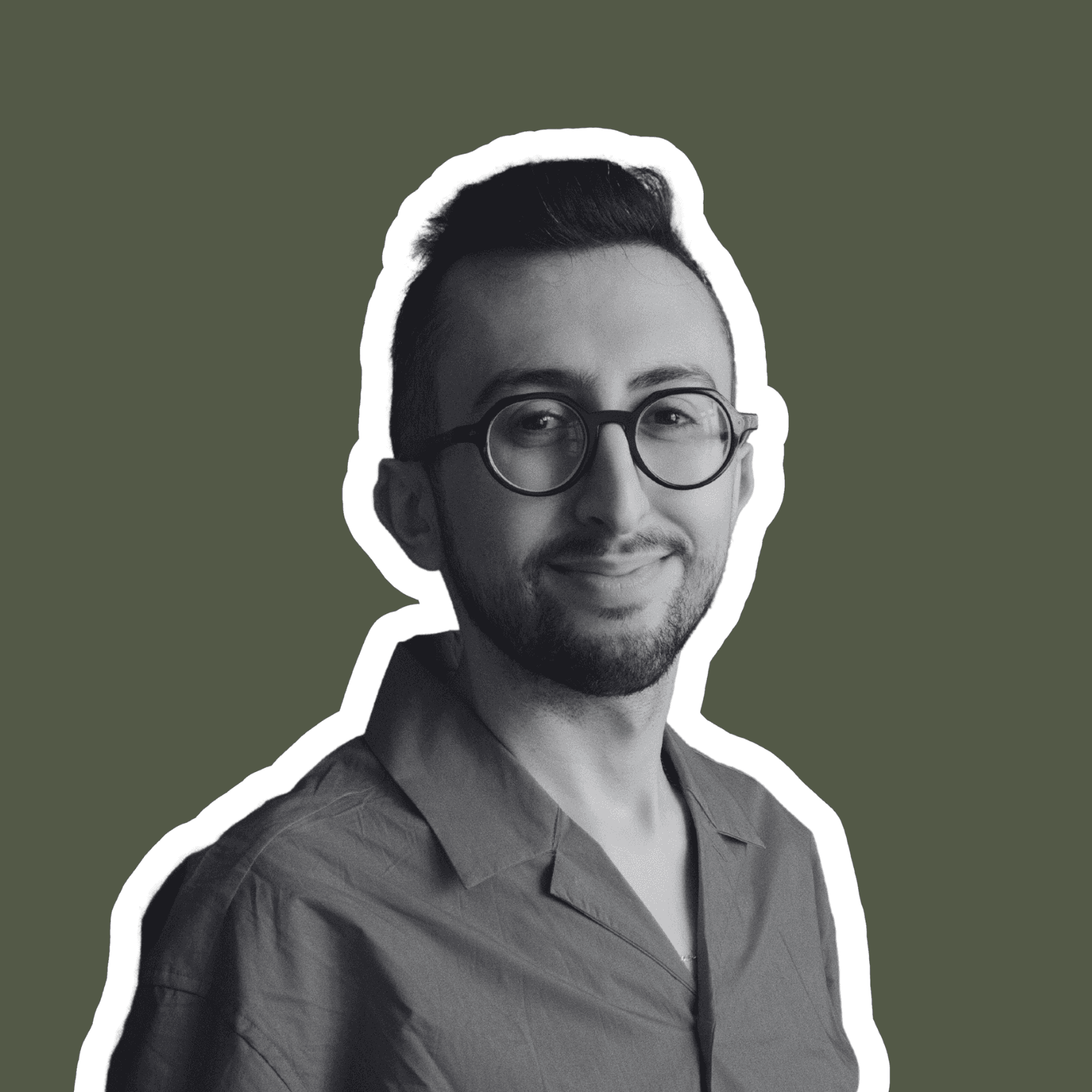 A portrait of a young man smiling