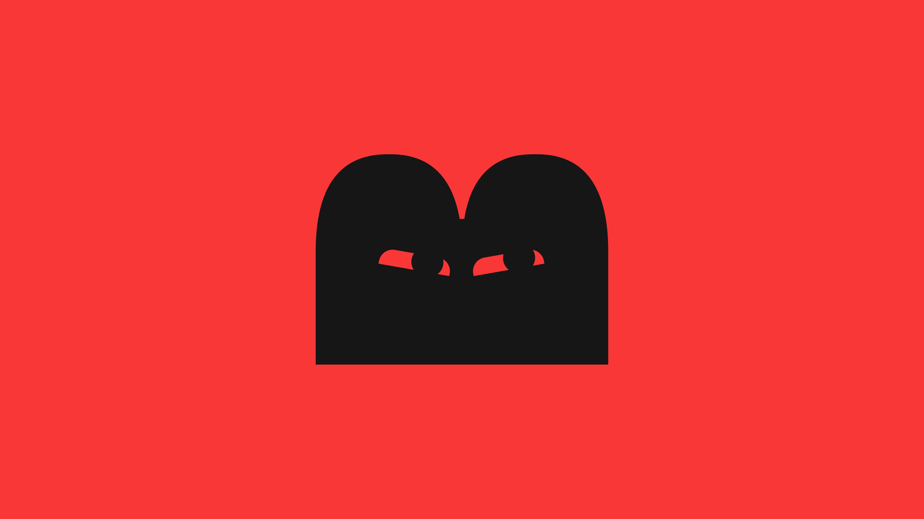 Logomark of a block on red bg