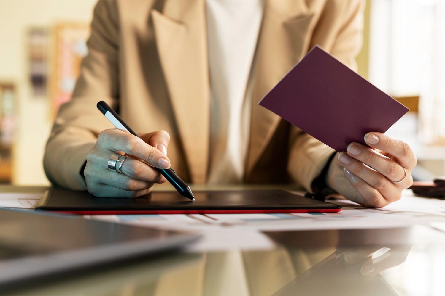 Passport copies being reviewed and signed as part of document requirements for a mainland license in Dubai