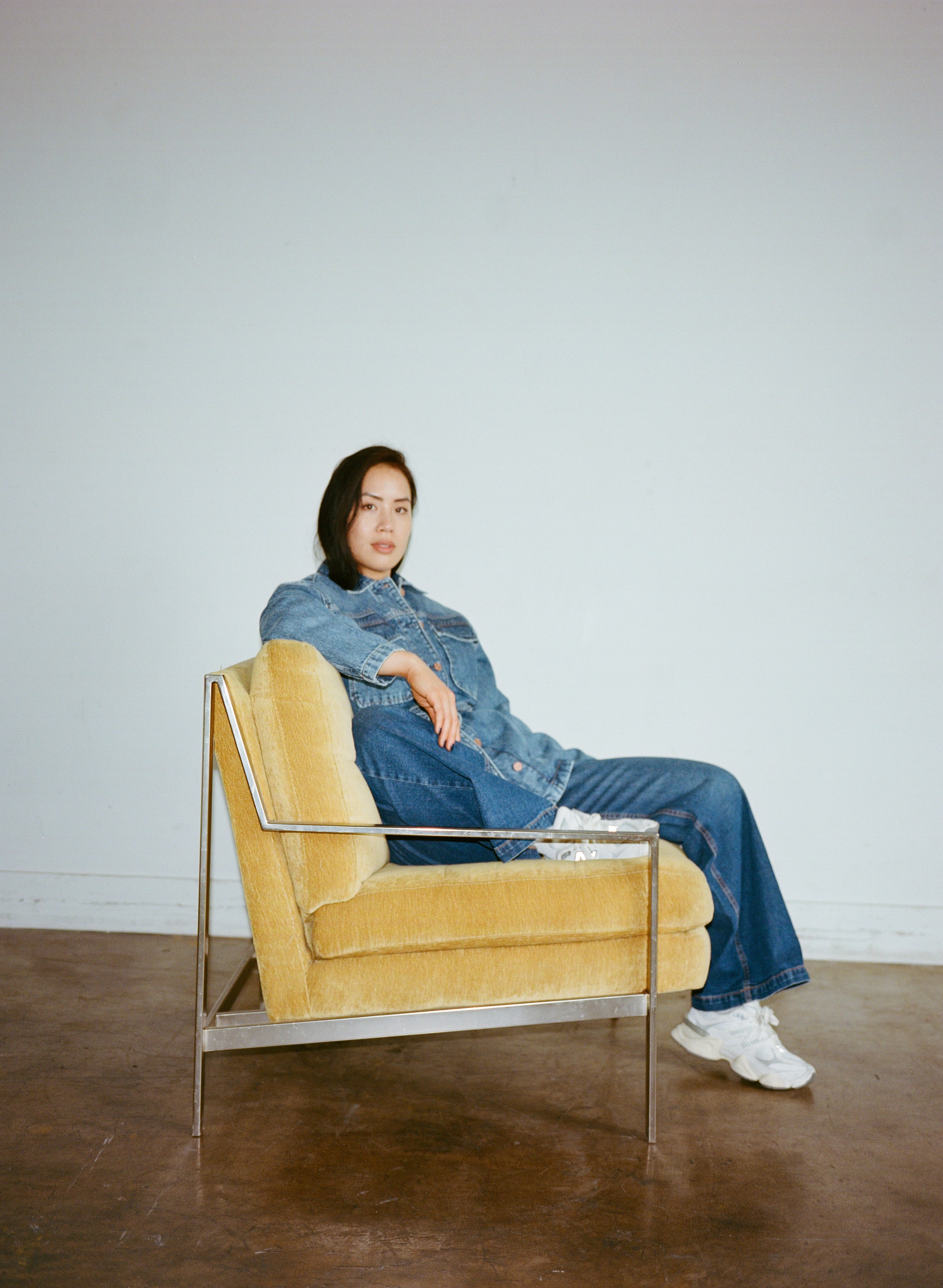 American flag flying against a cloudy sky