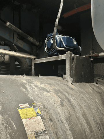 close-up of old return fan housing before hospital HVAC retrofit in NYC