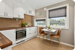 White and wood kitchen decor.