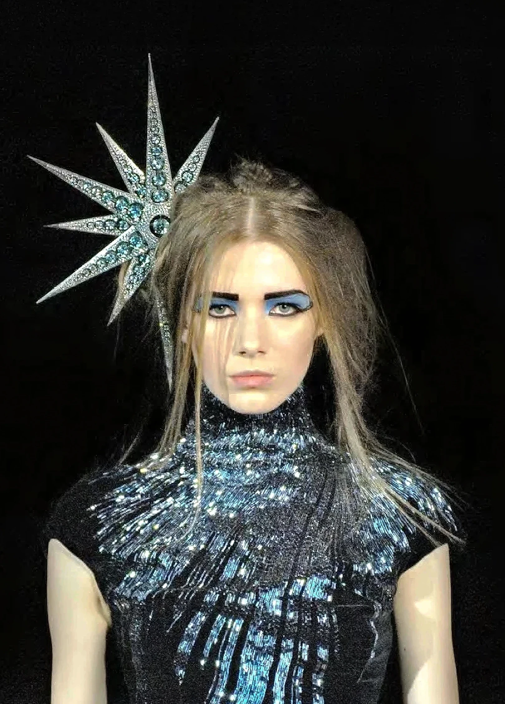 The celestial Star Headdress featuring shooting star motifs, designed by Shaun Leane for the historic Alexander McQueen Autumn/Winter 2007 collection.