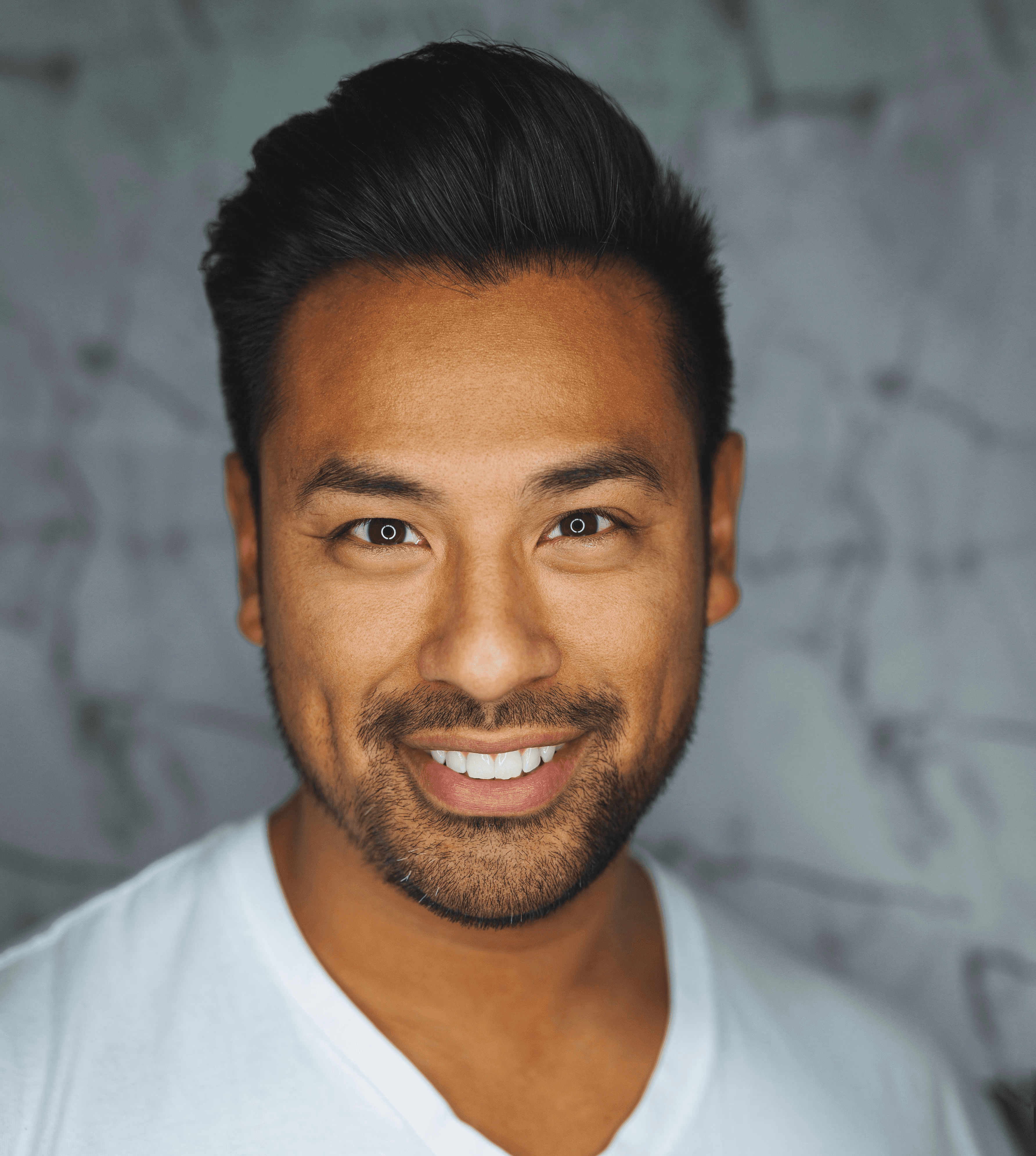 man wearing white V-neck shirt