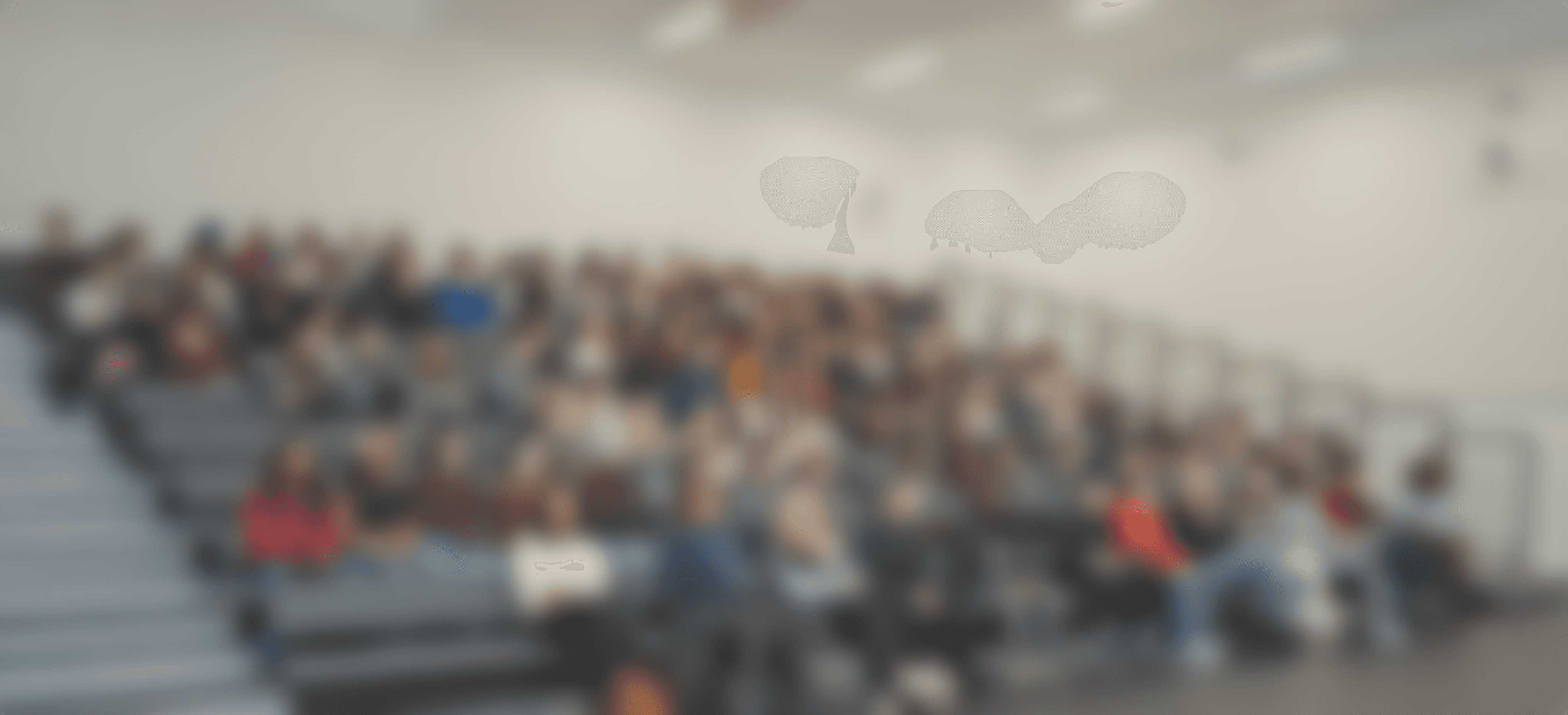 Modern spiral staircase with wooden accents and lighting