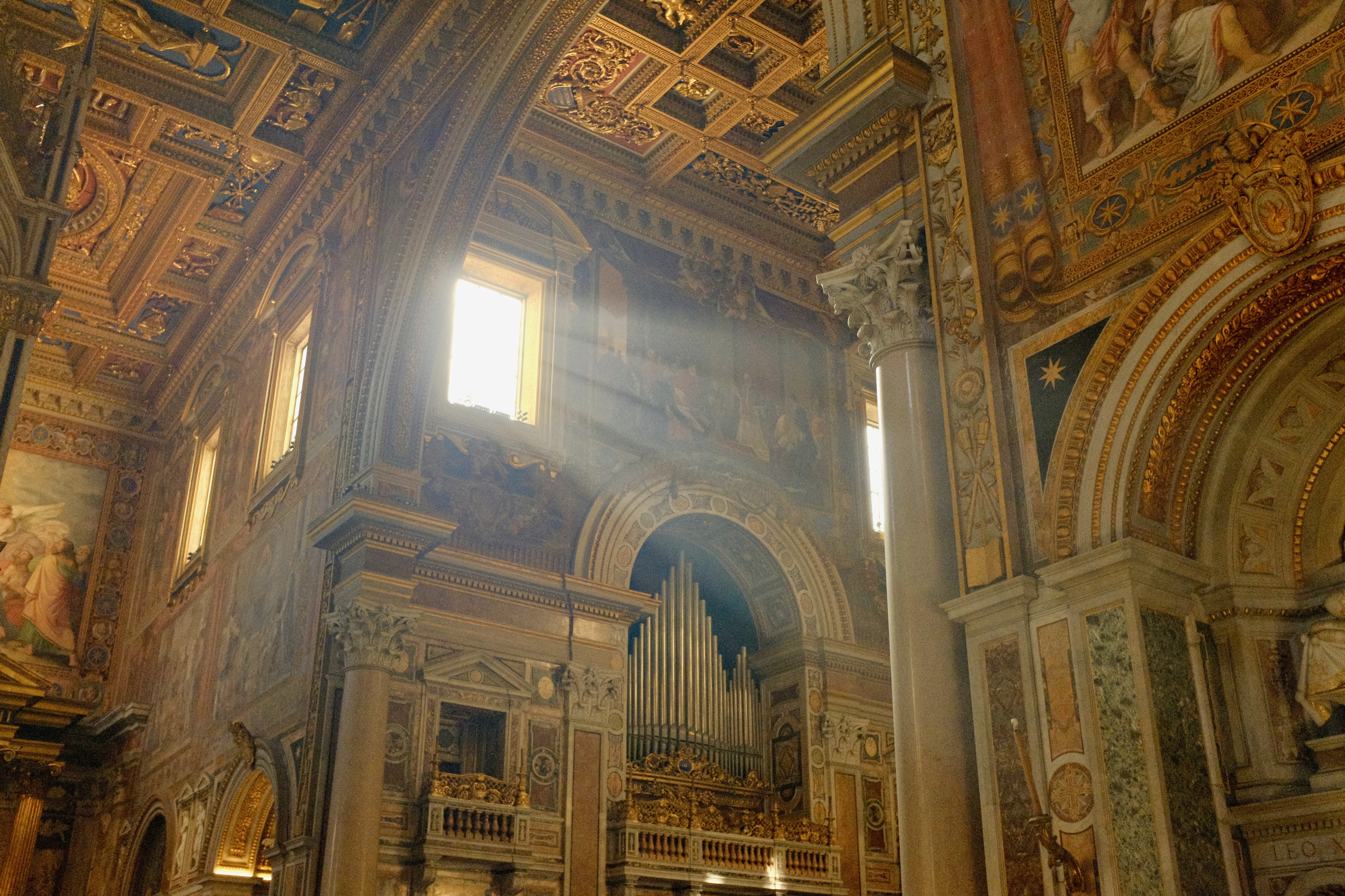 Sunlight streaming through a window at cathedral in Rome.
