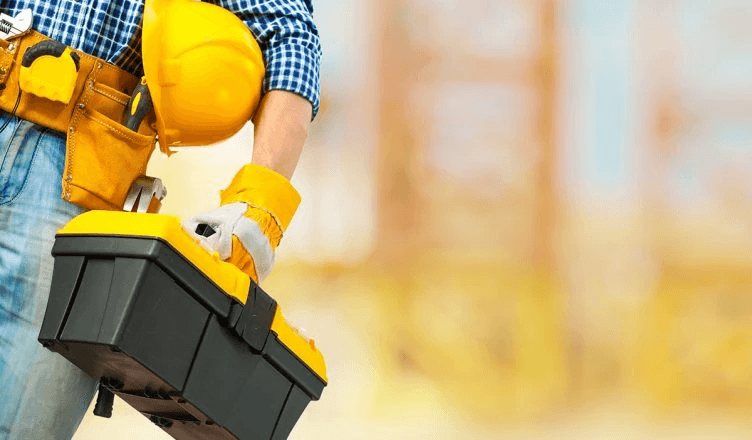 handyman carrying tools