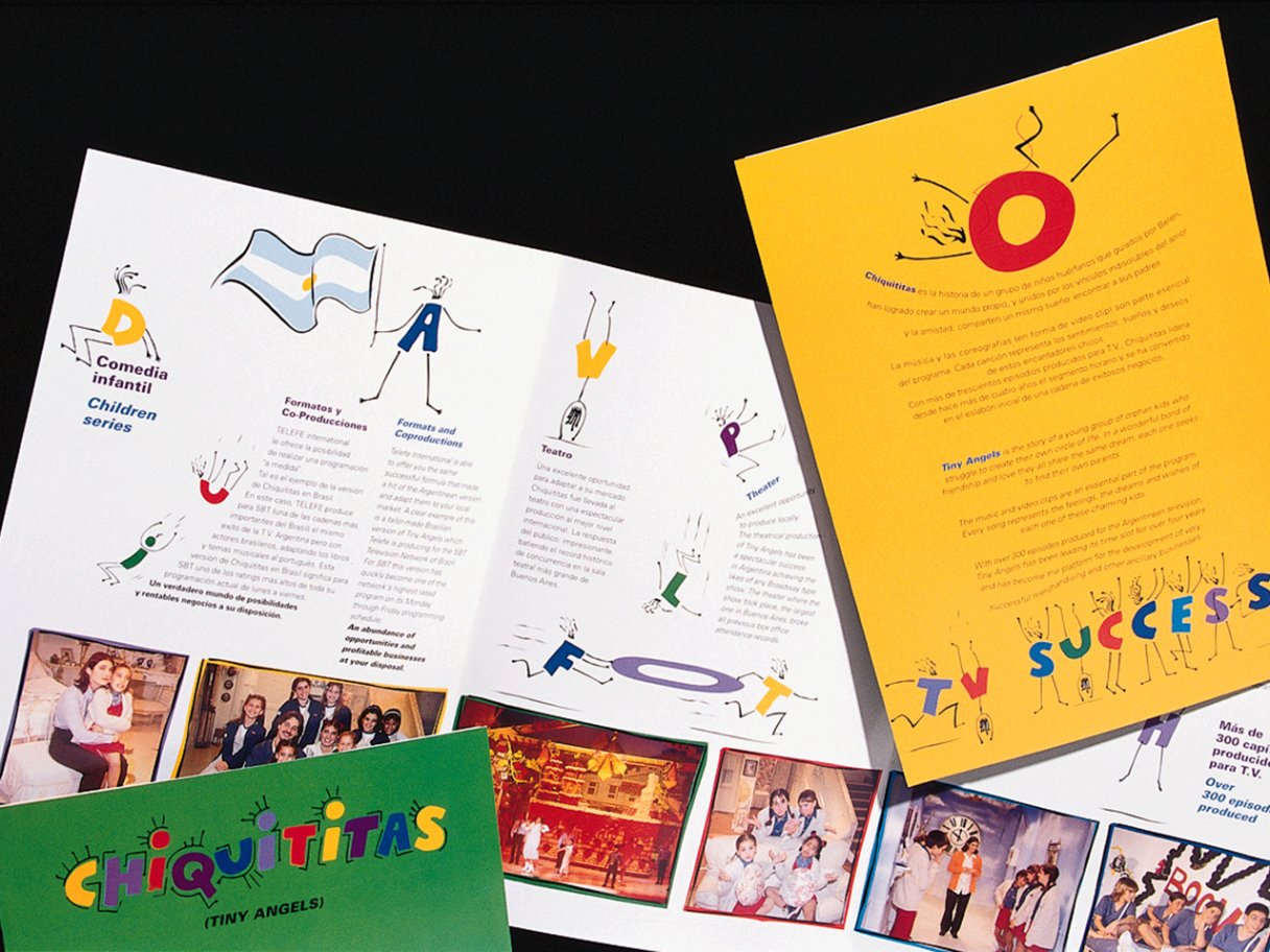 Rooftops of a coastal town with the sea in background