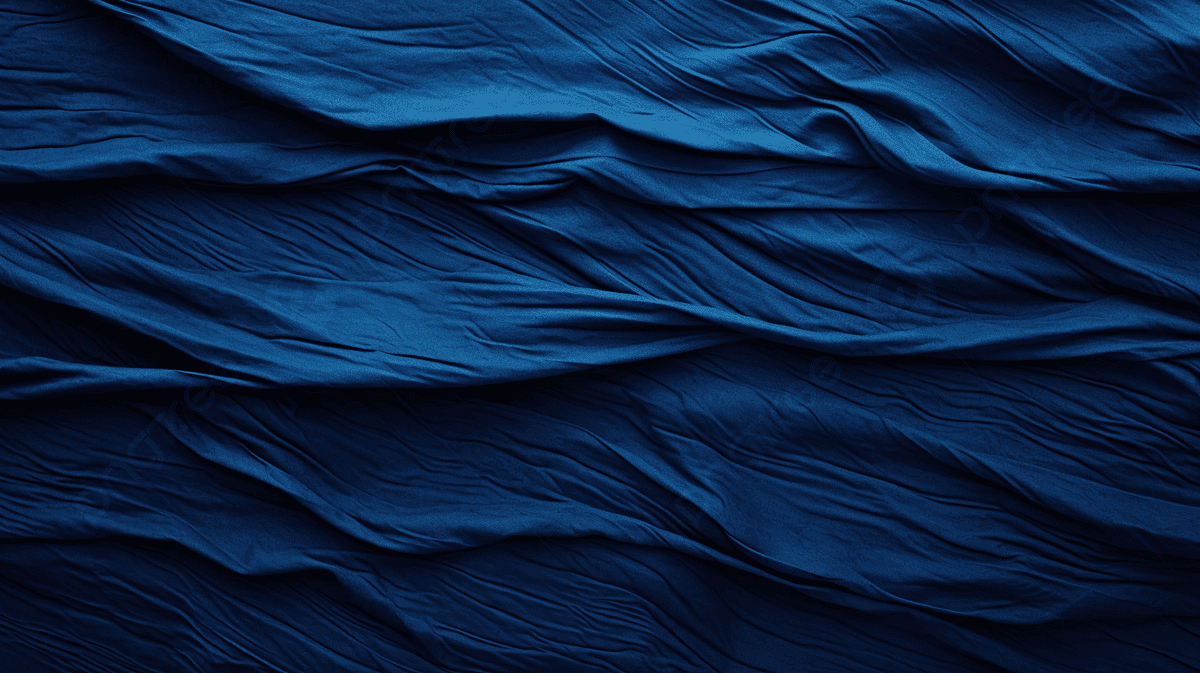 Close-up of blue fabric with folds and shadows. Textured background.