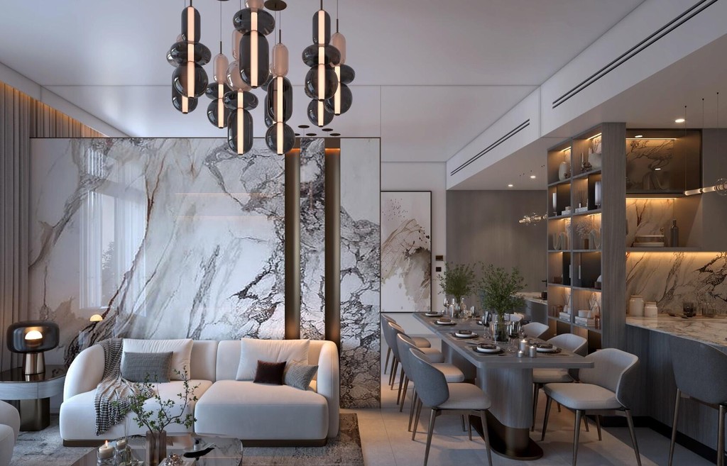 Contemporary living room with elegant marble walls and furniture, showcasing the design of Vista by Vision.