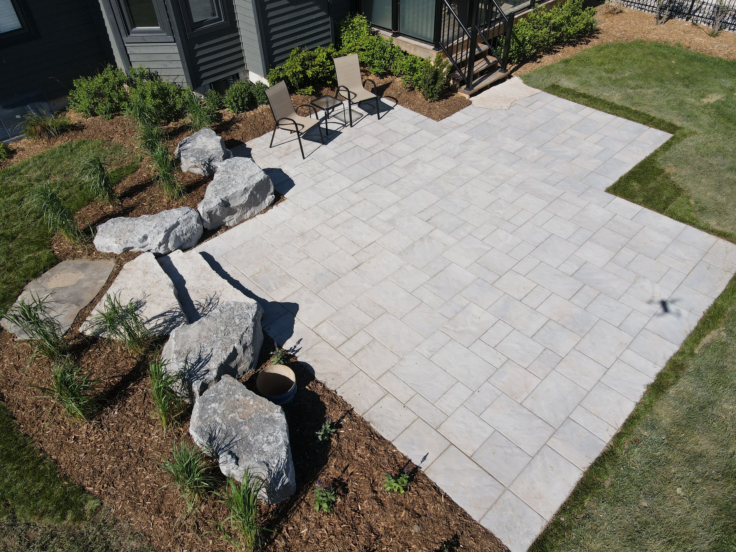 Paver patio with armour stone