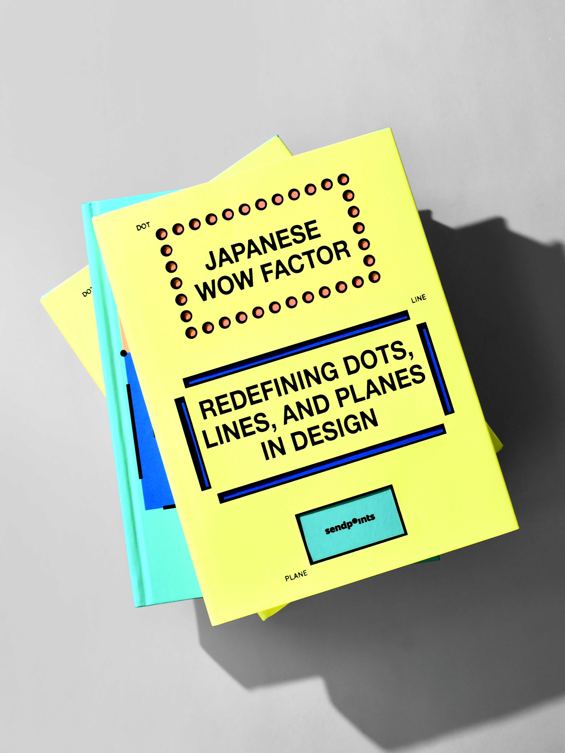 Cover of the book Japanese WOW Factor, featuring bold yellow graphic design.