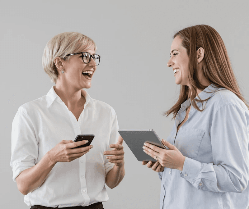 Student studying on a laptop in her UK accommodation room.