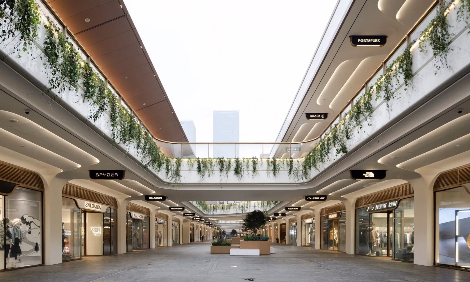 Indoor corridor full of green vines inside Chengdu SKP shopping mall