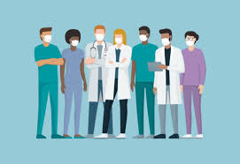 Two surgeons working in a hospital with the hands of a human heart