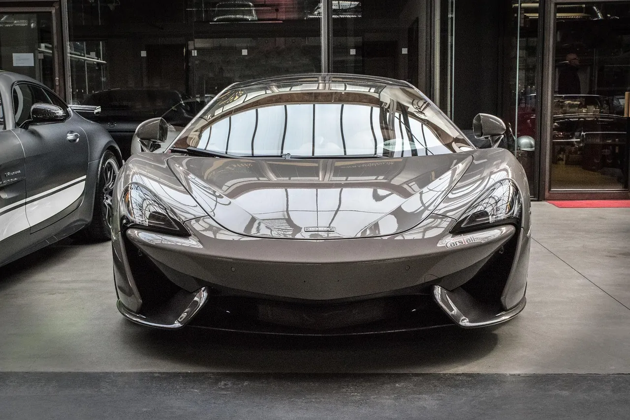 Gray McLaren sports car front view