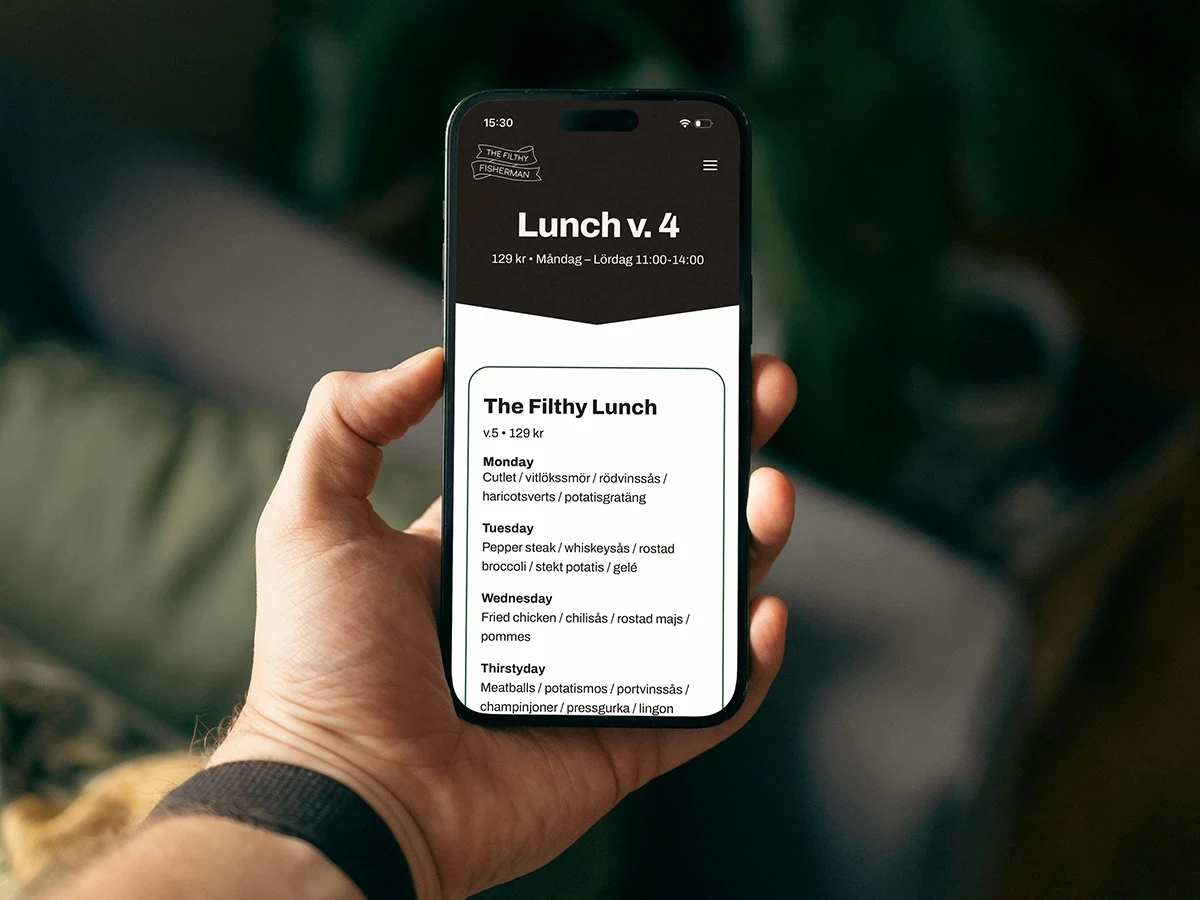 En iPhone som visar The Filthy Fishermans lunchmeny
