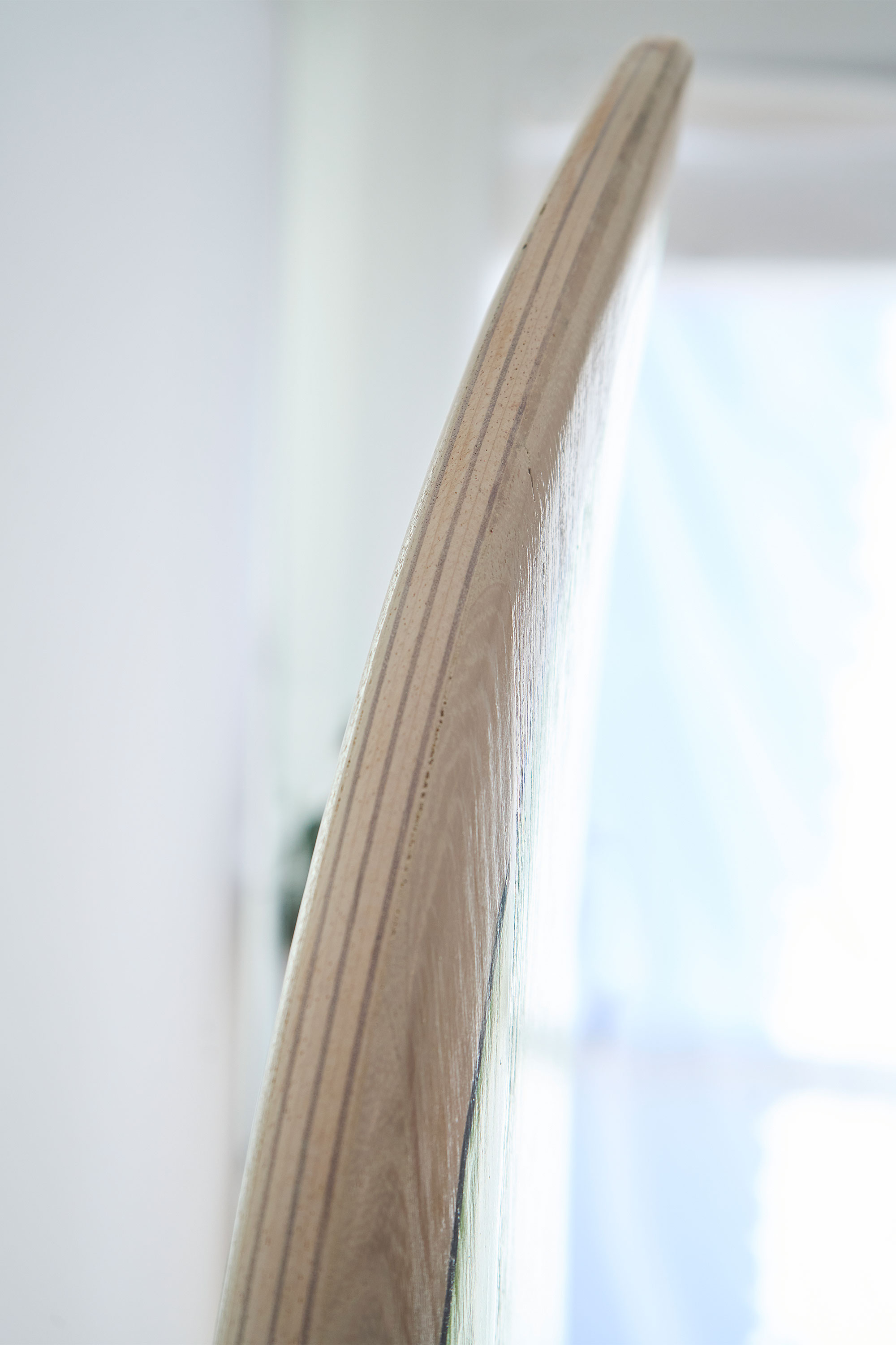 Wooden surfboard rail