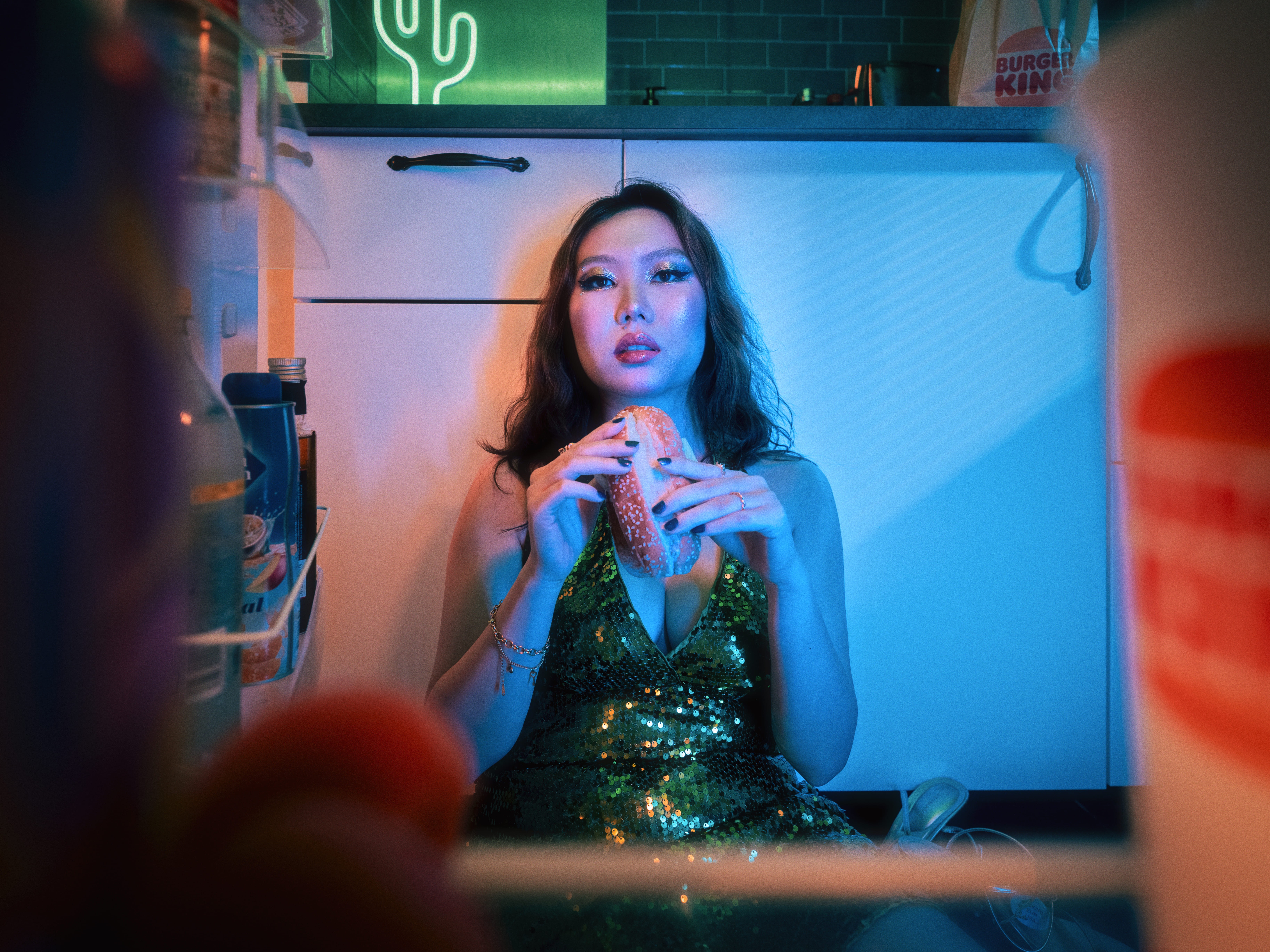 Streetside billboard with flyposters of the Batch.Works brand and illustrations