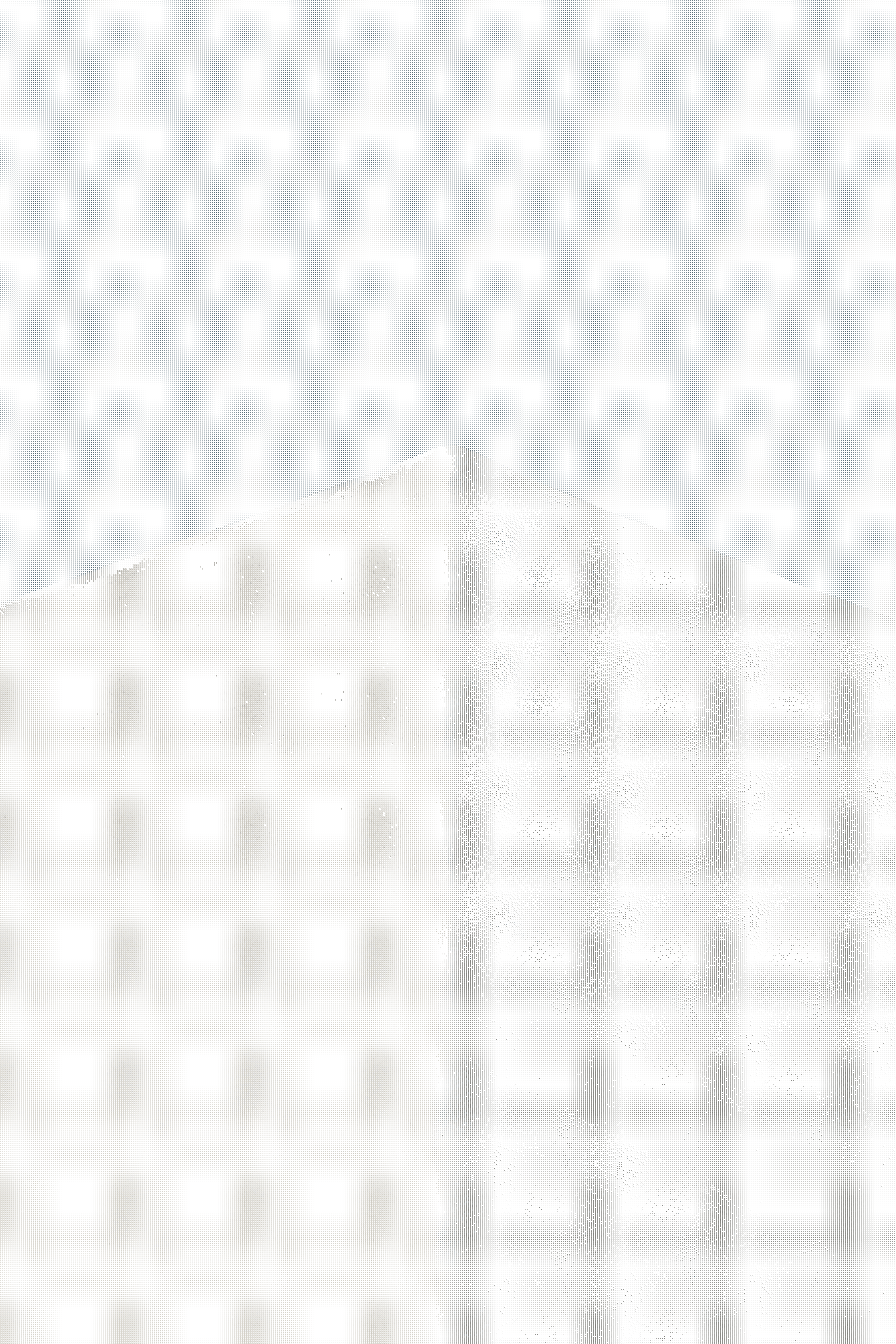 A tall white building with a sky background