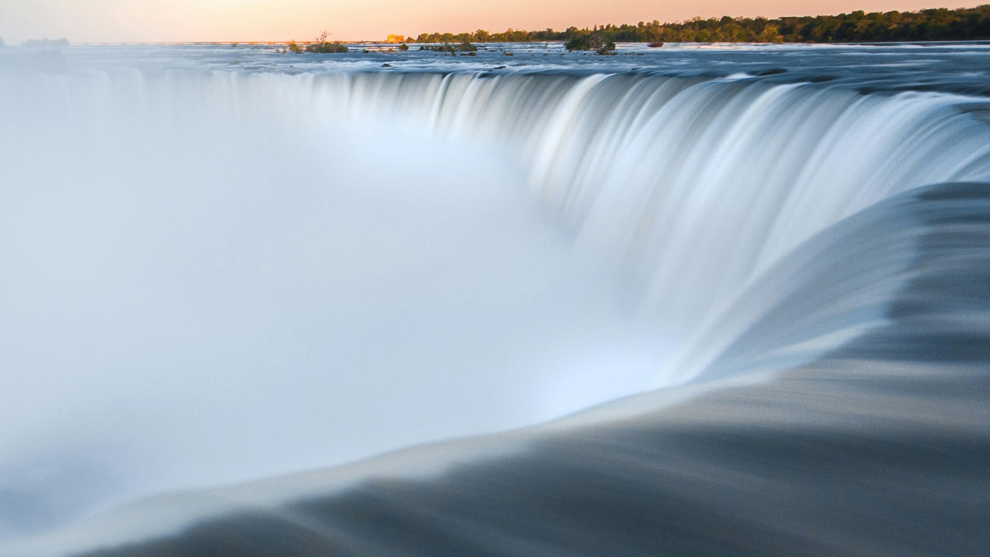 Water flowing into a waterfall