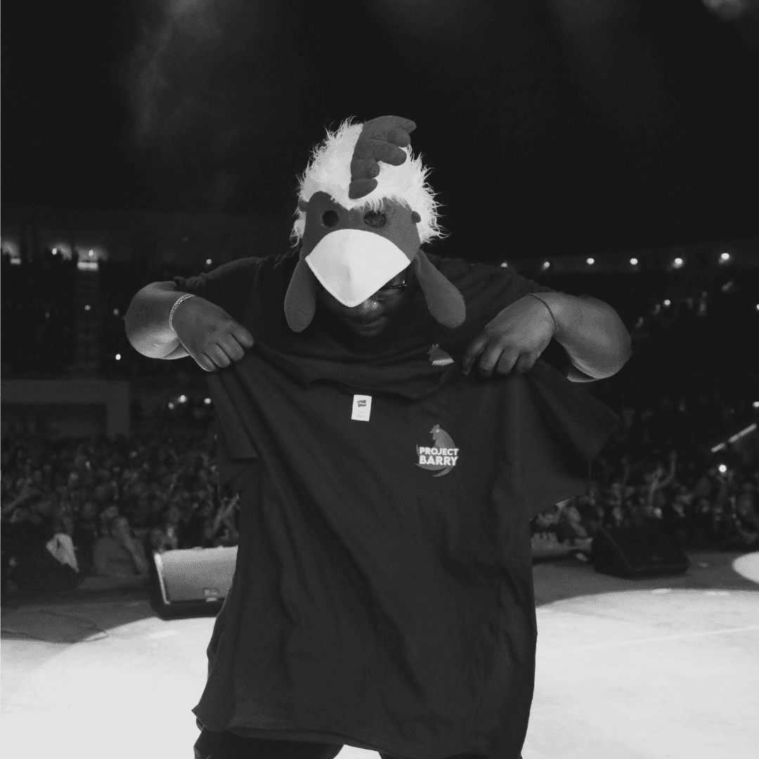 man in red suit posing in the night