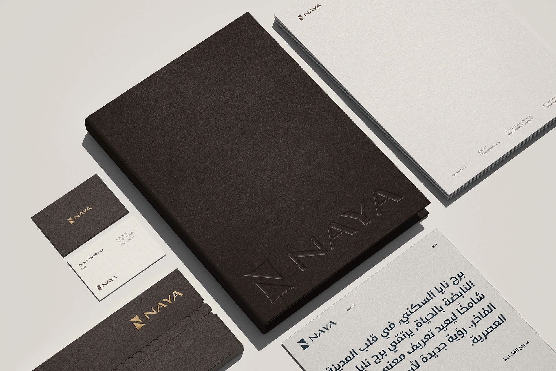 Streetside billboard with flyposters of the Batch.Works brand and illustrations