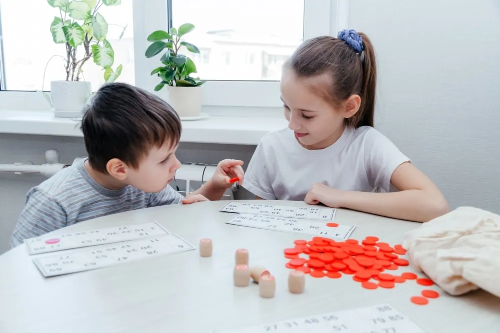 two children playing bingo