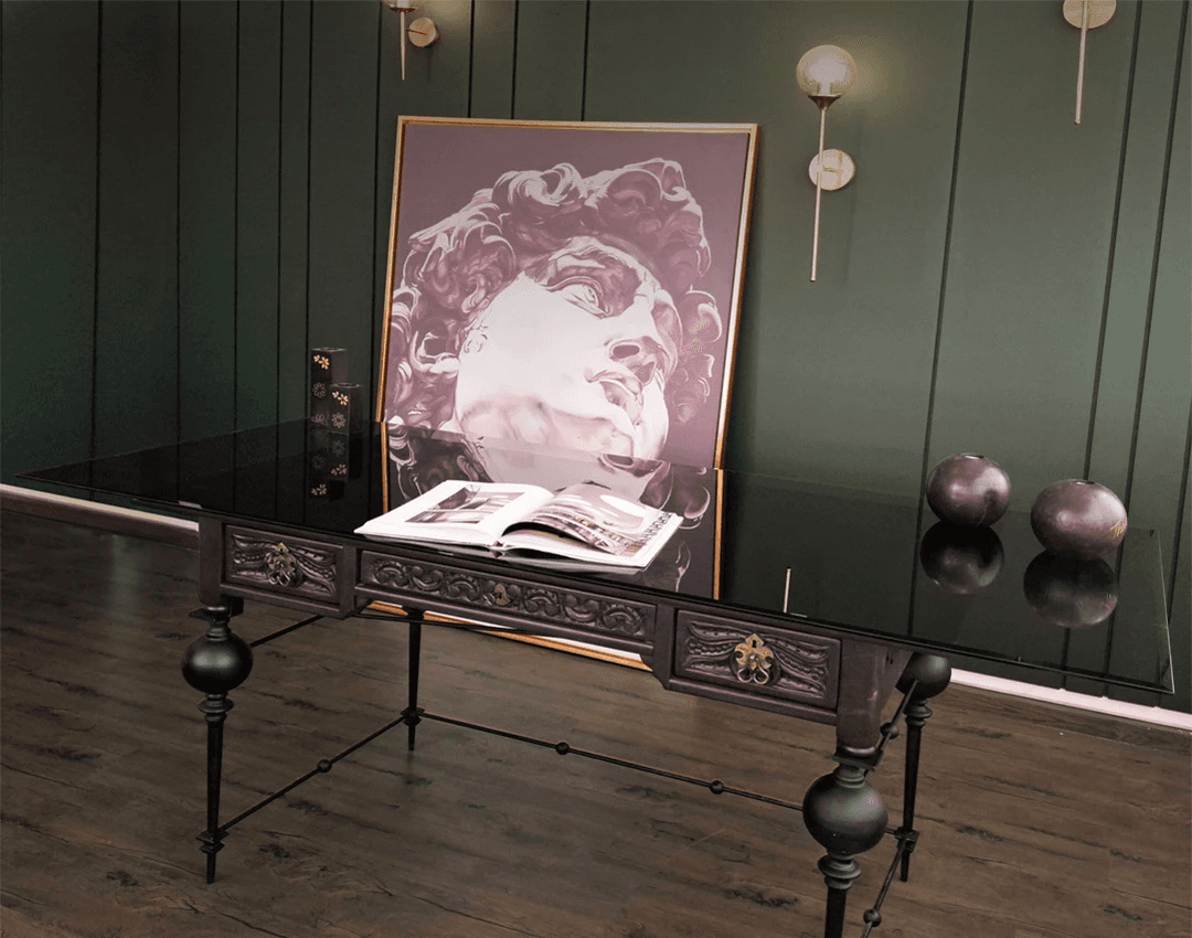 Antique carved wood desk with black steel legs and glass top – luxury furniture in Beirut