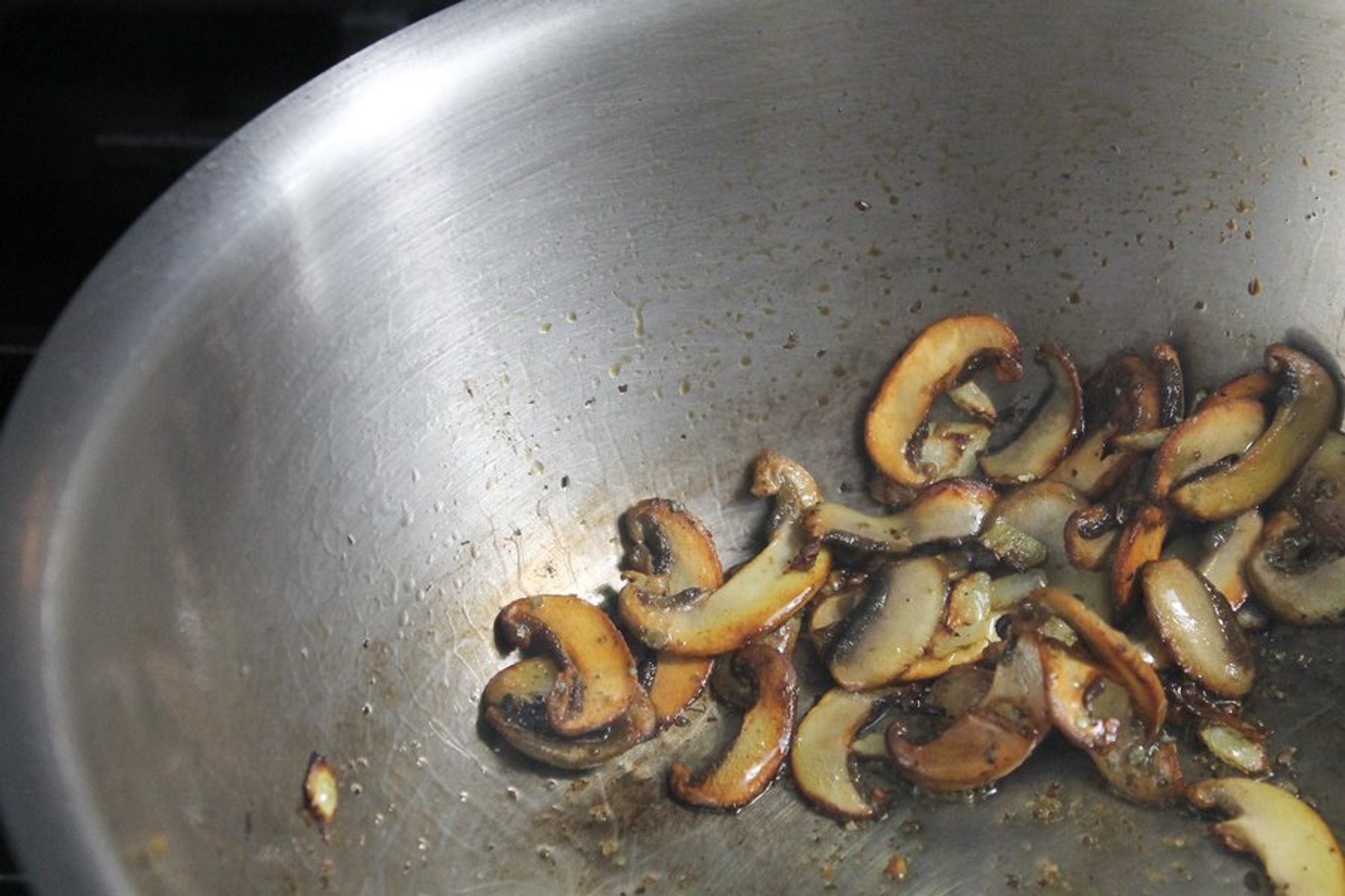 mushroom being cooked in a pan
