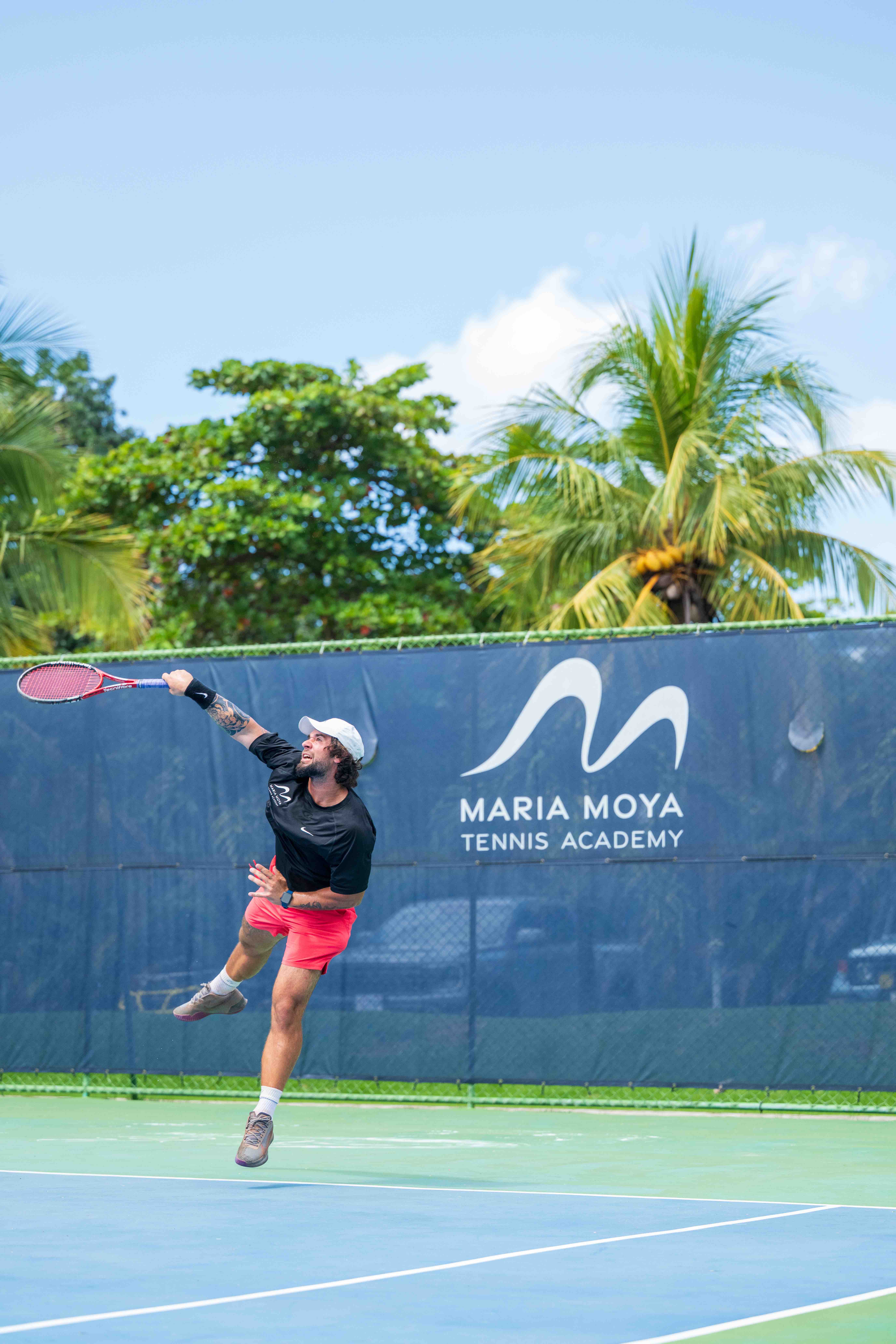 Flat-lay shot of spa amenities by the bathtub