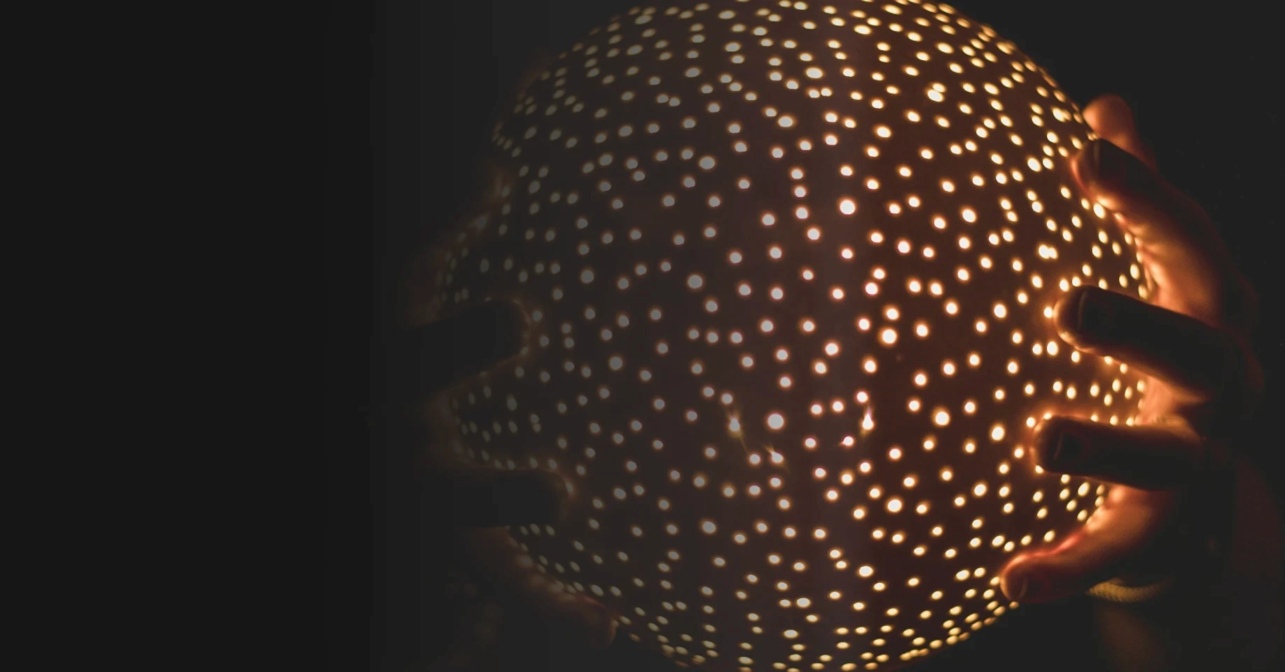 person raising both hands