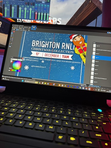 husband and wife working happily on a laptop